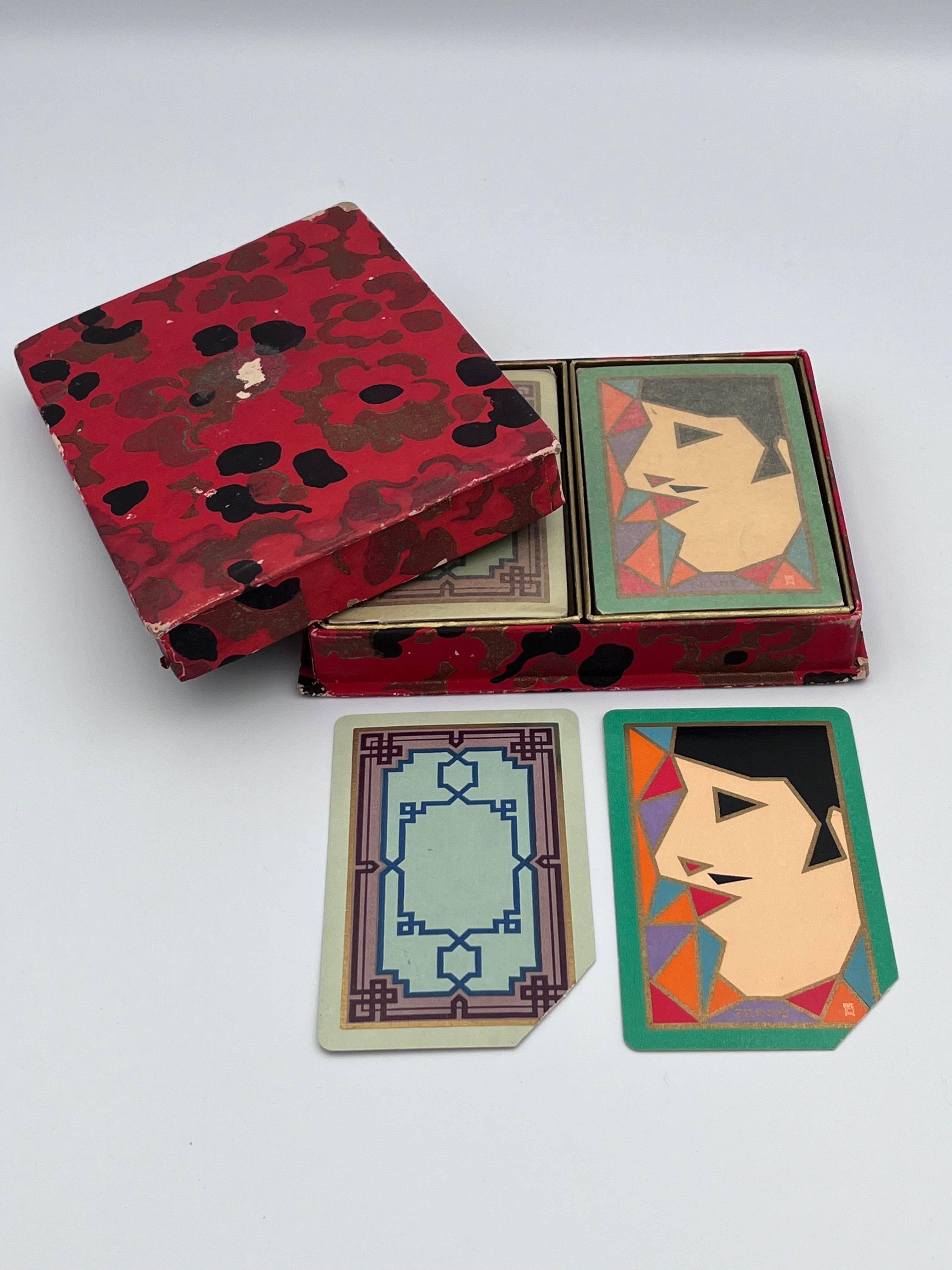Pair of Unopened Congress Art Deco Playing Card Decks in Original Box – Sealed with 10-Cent Tax Stamp

This pair of unopened Congress Playing Card decks is a rare find, preserved in its original Art Deco box. The exterior of the box showcases an