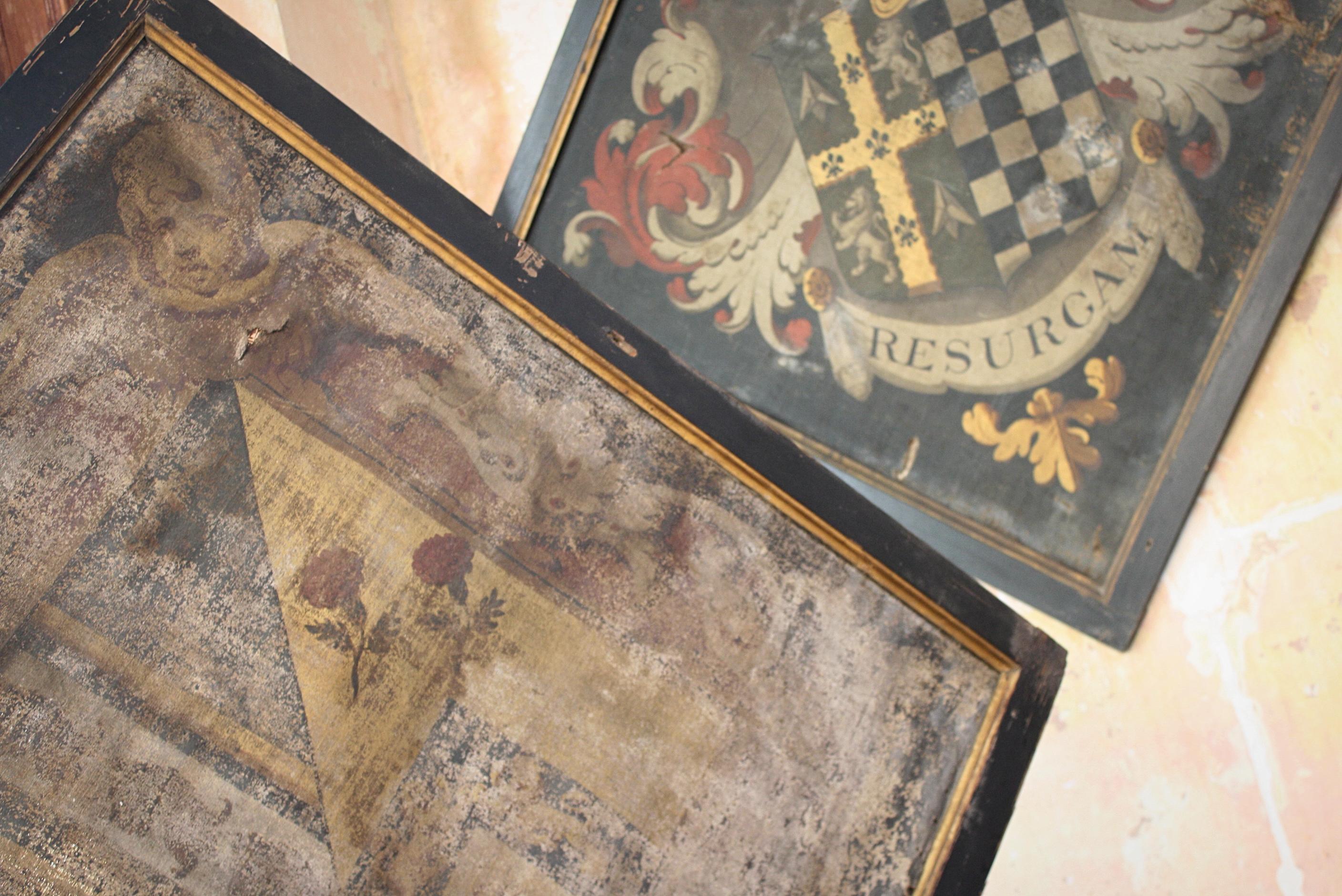 A rare pair of 18th century oil on canvas funeral hatchments, each hatchment has the latin motto 