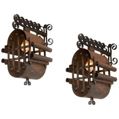 Pair of Unusual Northern European Patinated Iron Sconces