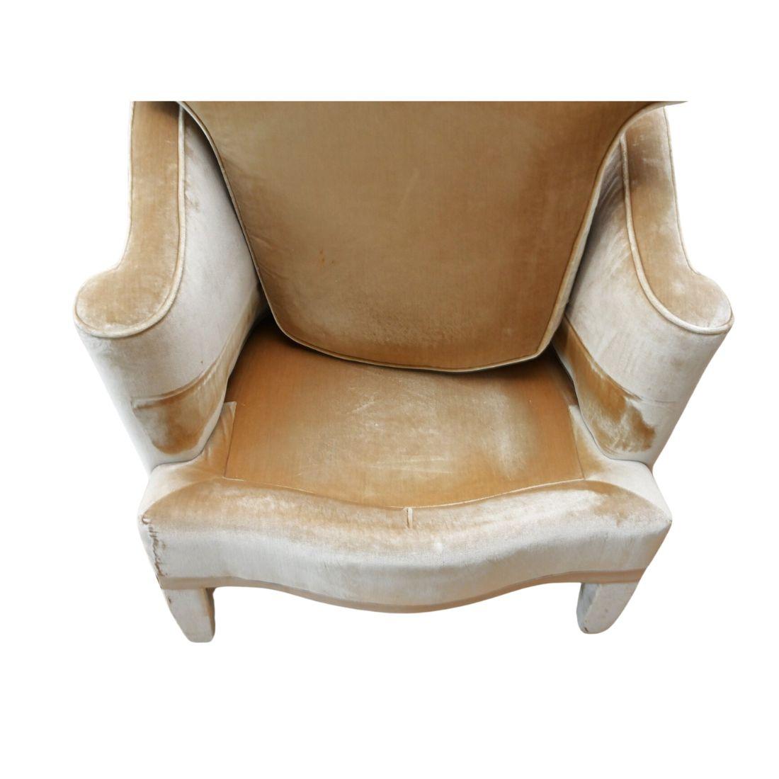 This pair of modern upholstered caramel velvet tub chairs exude luxury and comfort and add a touch of glamour to any space. The chairs are designed with elegant scroll arms that curve gracefully, offering both style and support. The square wood legs
