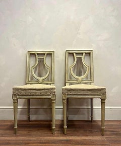 Paire de chaises françaises tapissées à dossier en forme de lyre, circa 1900