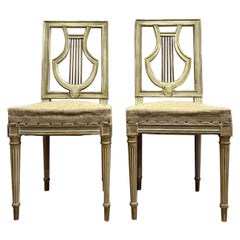 Paire de chaises françaises tapissées à dossier en forme de lyre, circa 1900