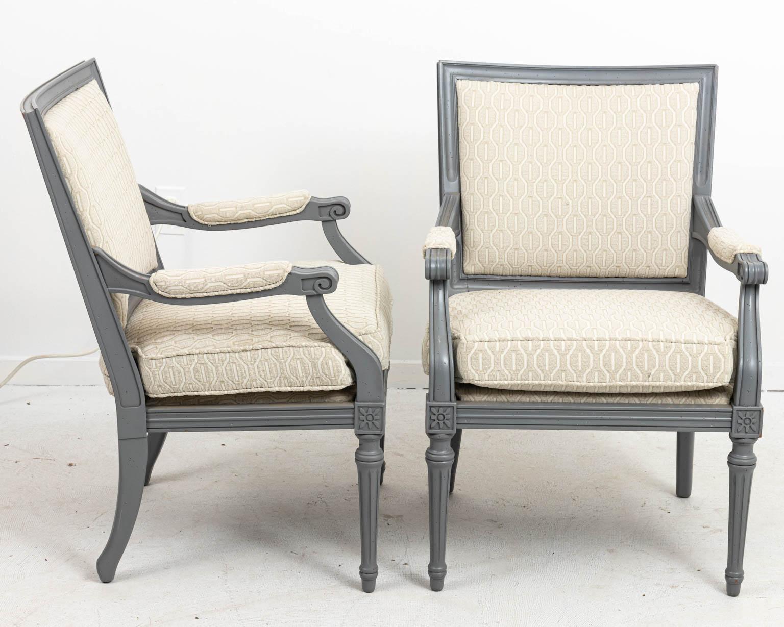 Pair of upholstered French Directoire armchairs with painted wood frame and square backs. Please note of wear consistent with age.