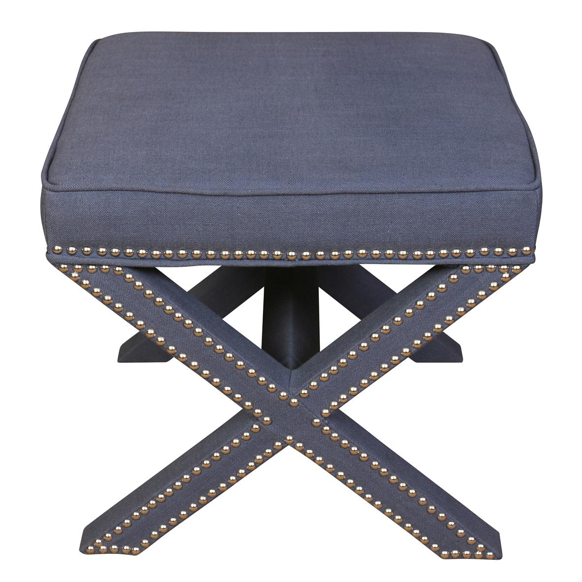 A pair of upholstered square benches in blue linen with nickel nail head detail and X shaped base
