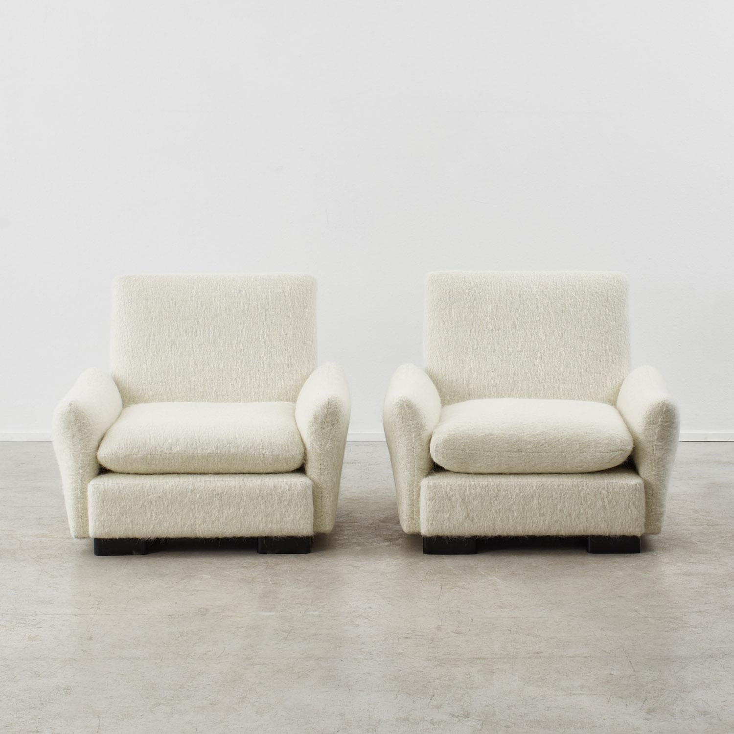 Italian Pair of upholstered low armchairs - Italy, 1970s