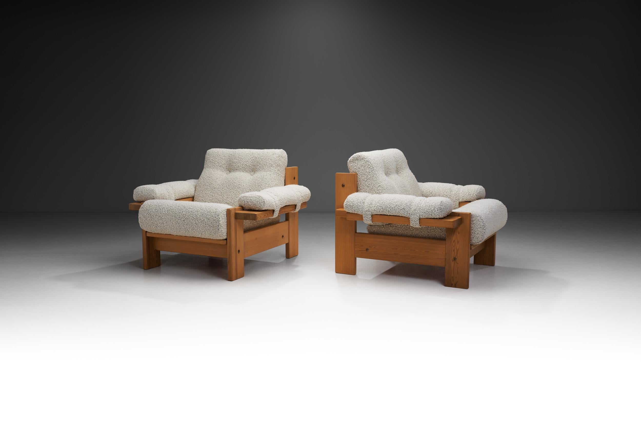 These elegant and sturdy lounge chairs, crafted in Europe during the 1970s, bring a timeless charm to any space. They feature a grid of vertical and horizontal lines and have robust pine wood frames, showcasing the enduring quality of mid-century