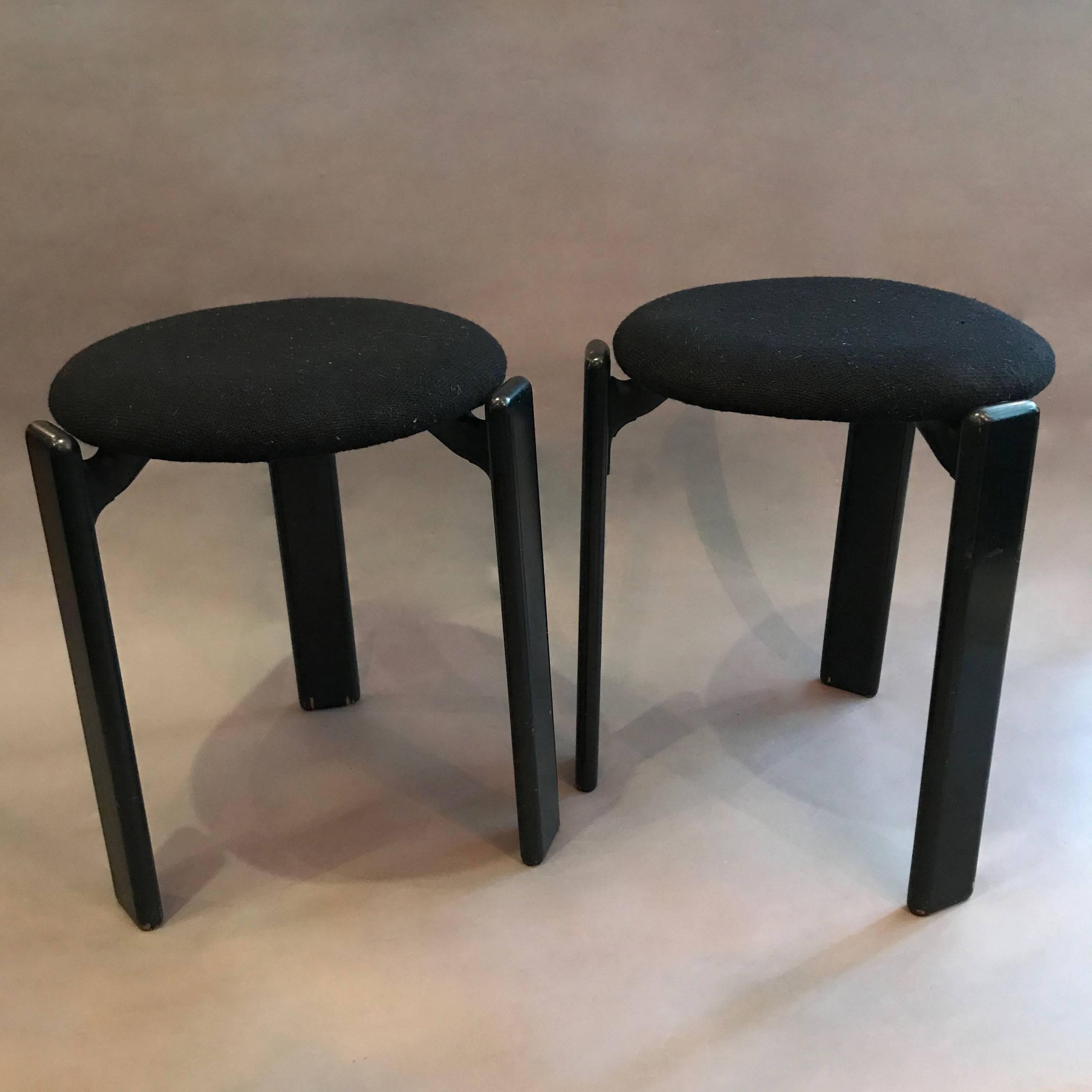 Pair of stacking stools by Bruno Rey for Stendig feature black lacquered wood frames with newly upholstered black wool seats.