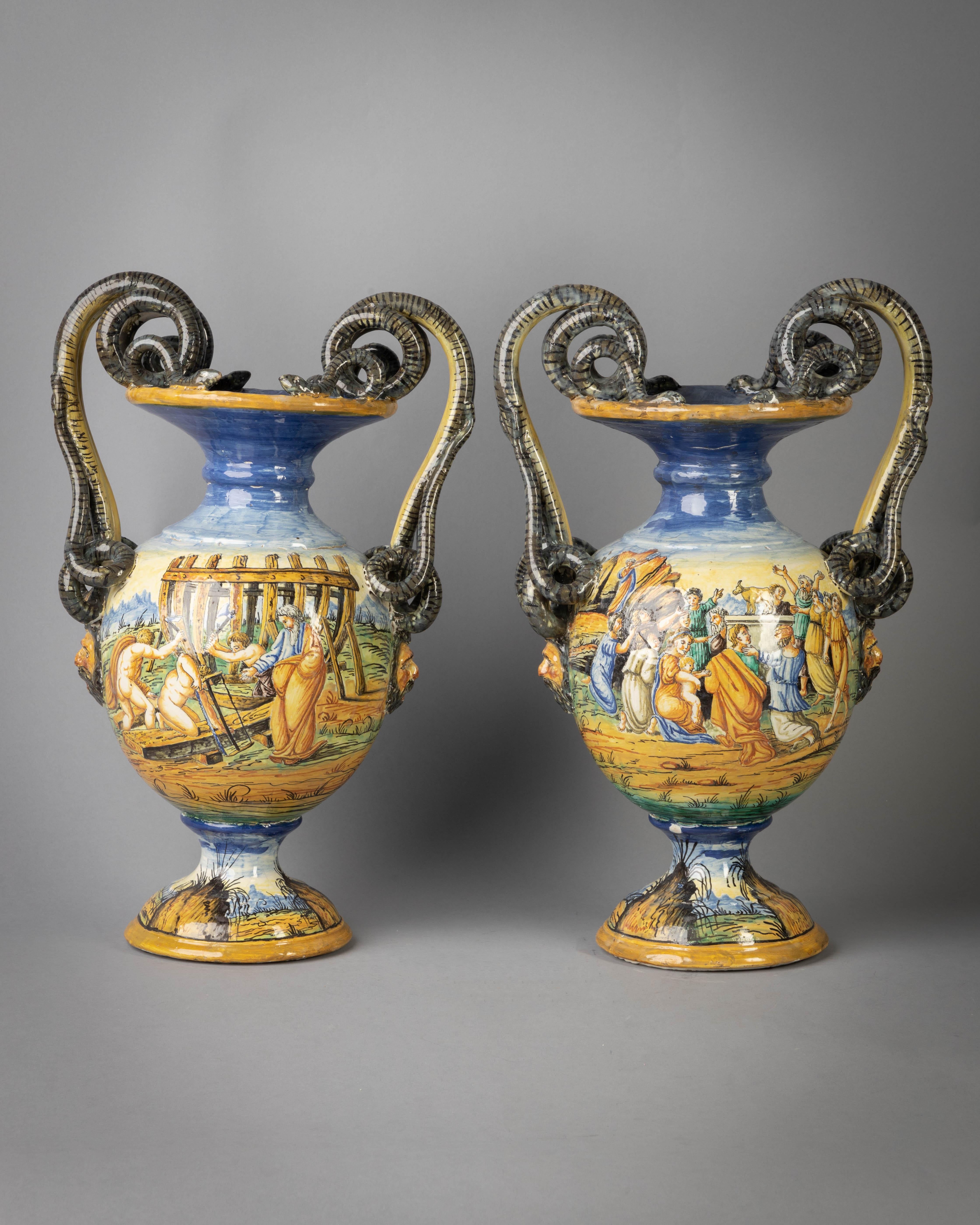 With entwined serpent handles, painted in colors on both sides of the bodies with biblical scenes.