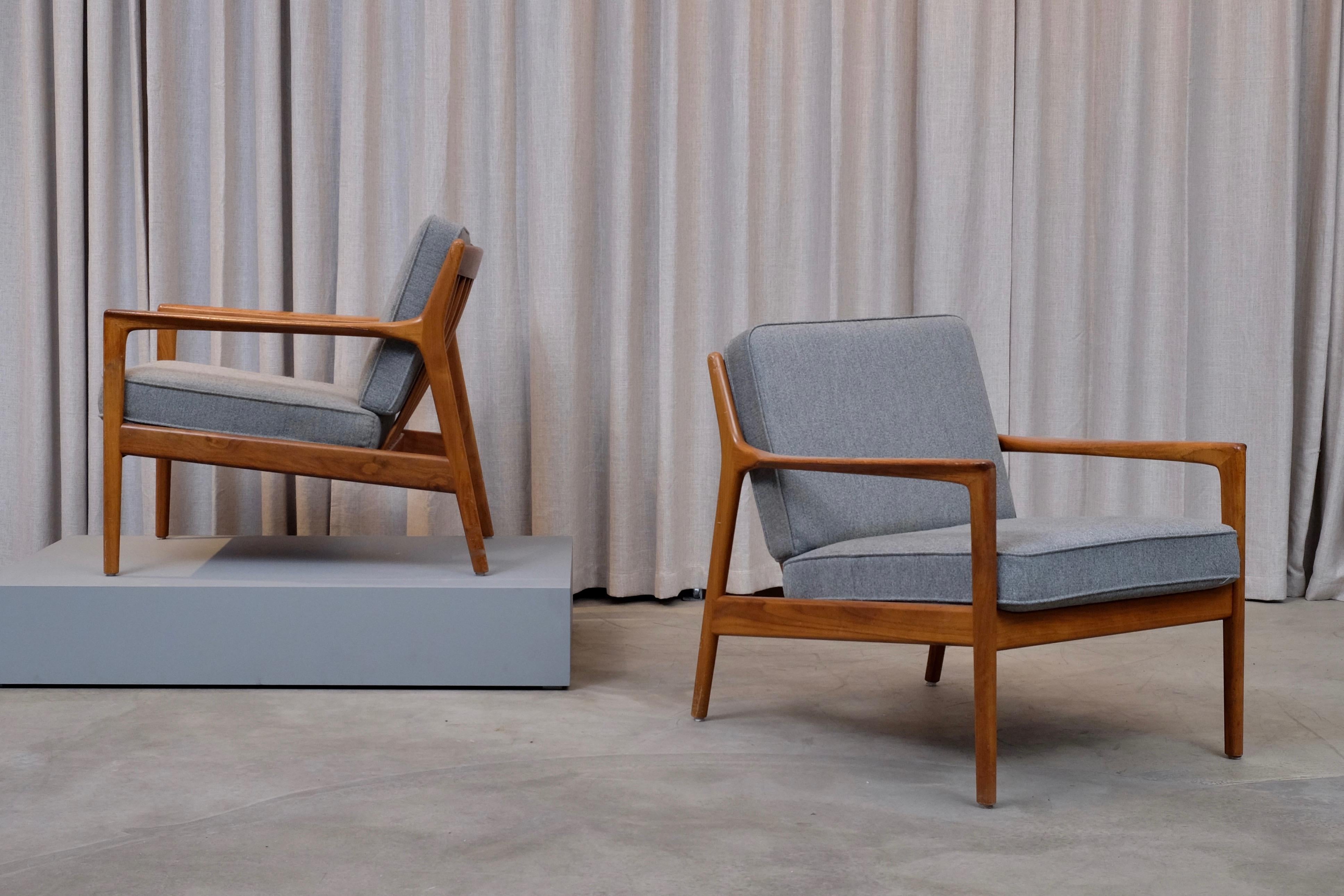 Swedish armchairs in teak by Folke Ohlsson for DUX, Sweden, 1960s.
Excellent vintage condition with signs of usage and patina. 


 