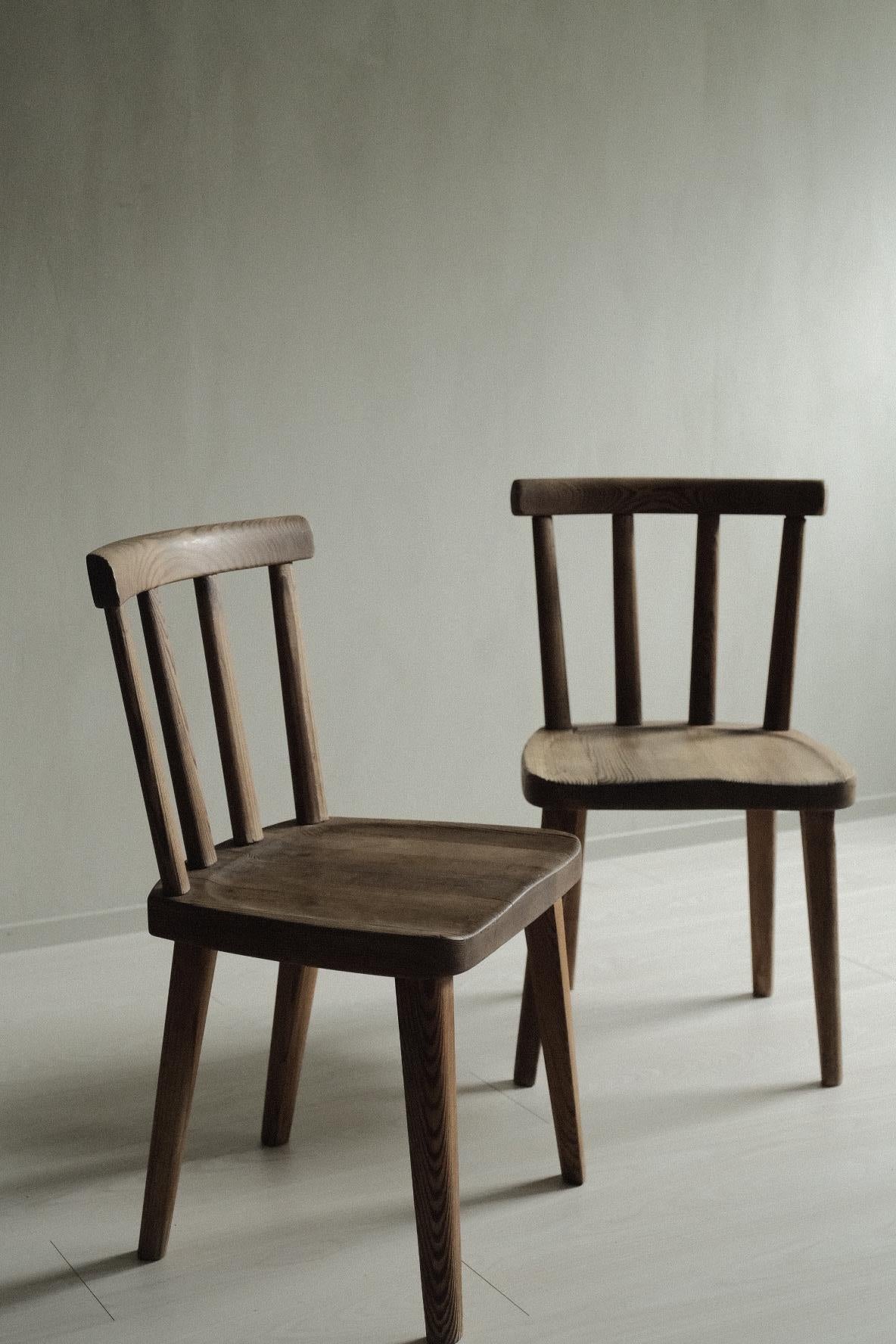 A pair of beautiful patinated Utö chairs by Swedish designer Axel Einar Hjorth, produced by Nordiska Kompaniet in Sweden, 1930s. 



