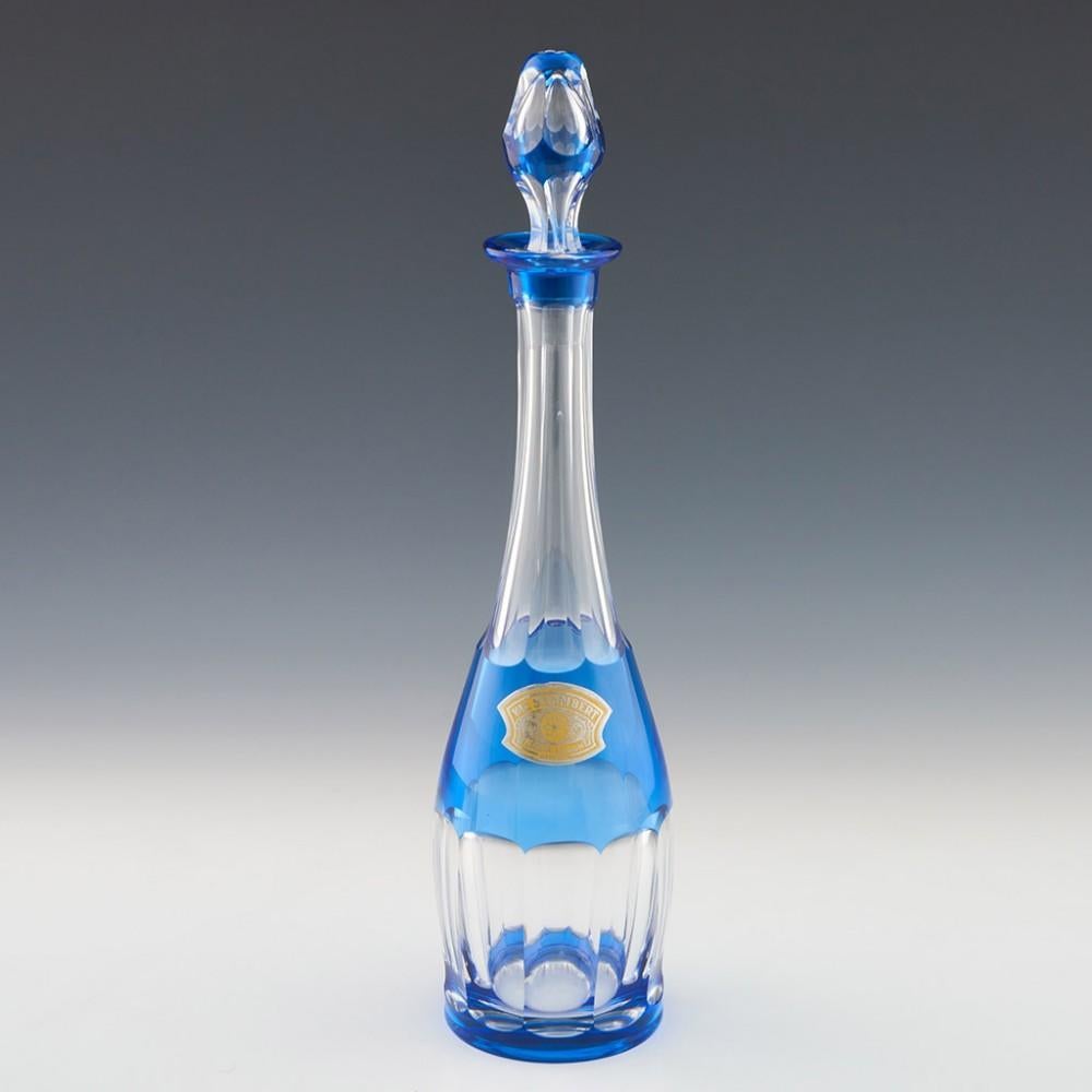 Pair of Val St Lambert Decanters, c1980

Additional Information:
Heading: Pair of Val St Lambert decanters 
Date: c1980
Origin: Belgium
Colour: Royal blue and clear
Stopper: Hollow slice cut 
Neck: Slice cut
Body: Slice cut, clear glass cased in