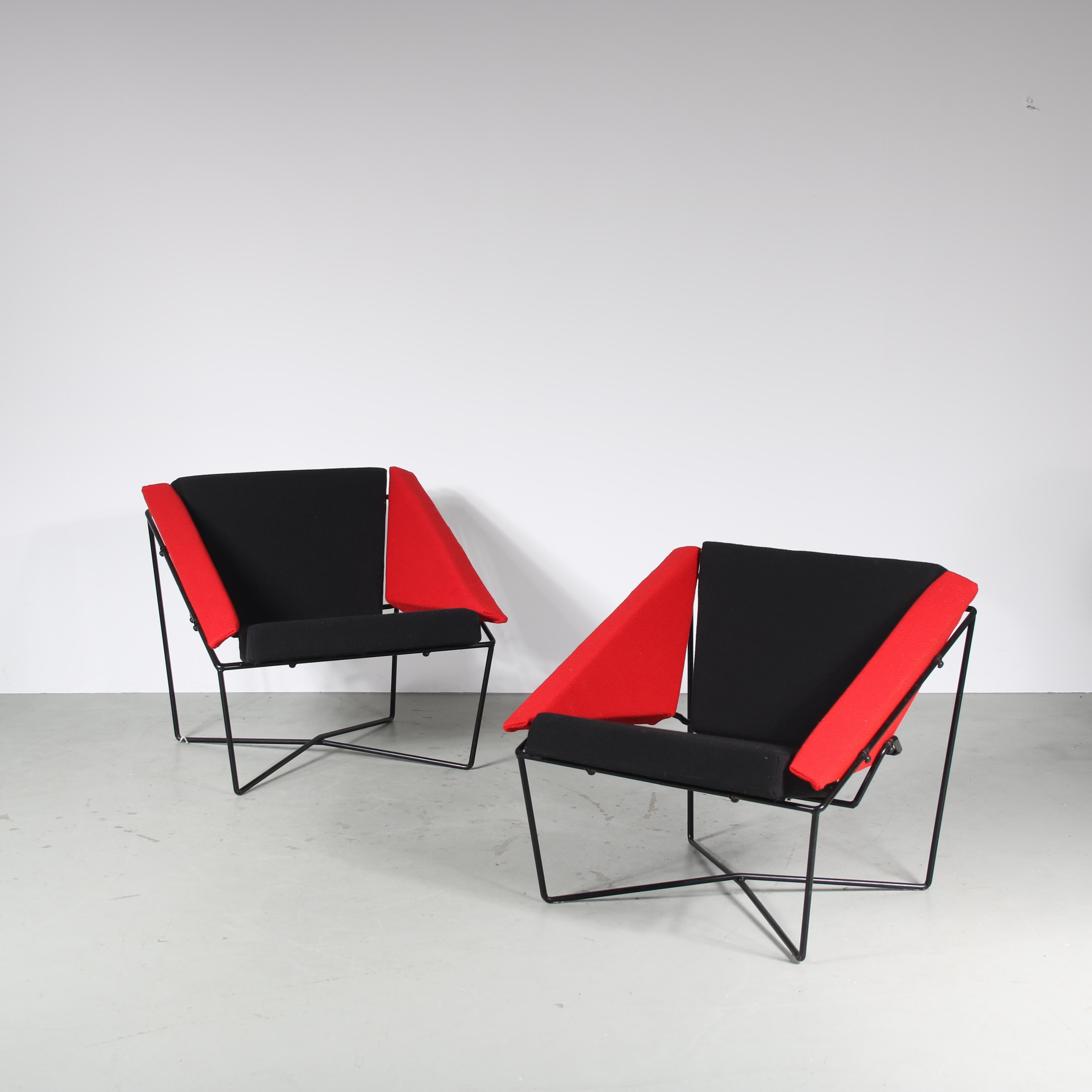 A lovely set of two lounge chairs, model “Van Speyk”, designed by Rob Eckhardt and manufactured in very small amount by Pastoe in the Netherlands in 1984.

The chairs have black lacuqered tubular metal bases in nice geometric shapes. These shapes