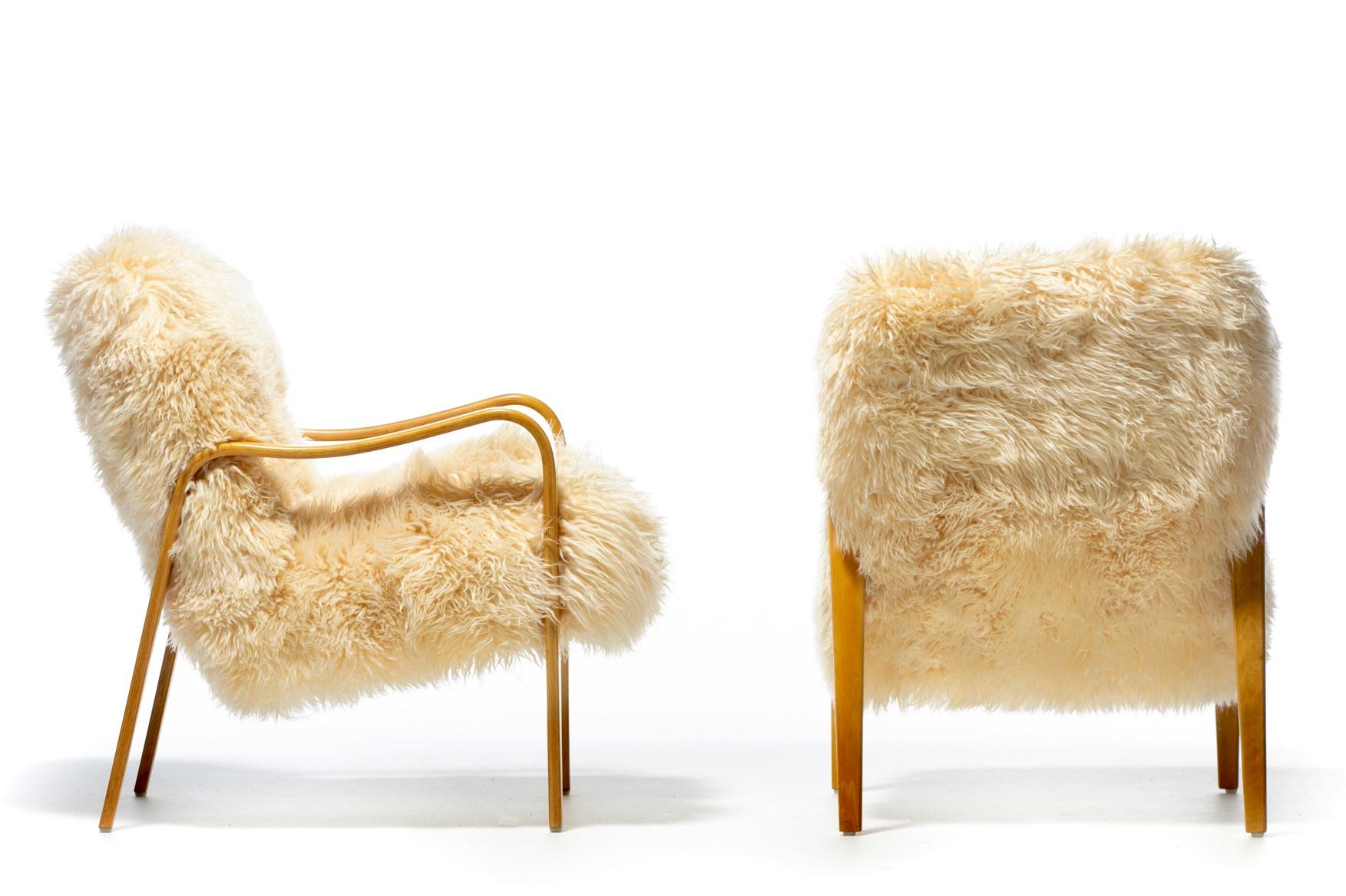 Pair of Vanilla Creme Sheepskin Lounge Chairs with Bentwood Arms by Thonet In Good Condition For Sale In Saint Louis, MO
