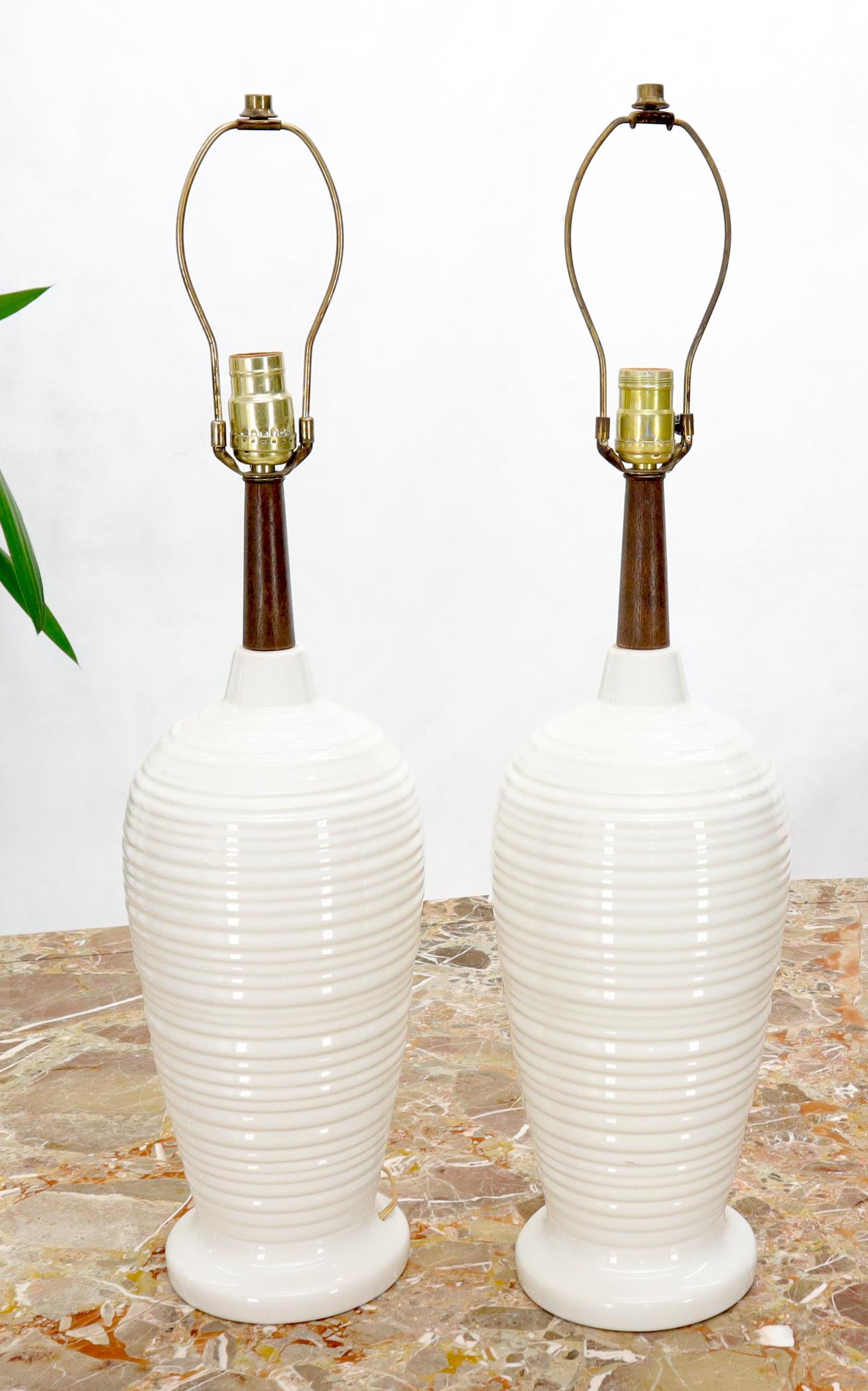 Pair of Mid-Century Modern vase shape glazed table lamps.