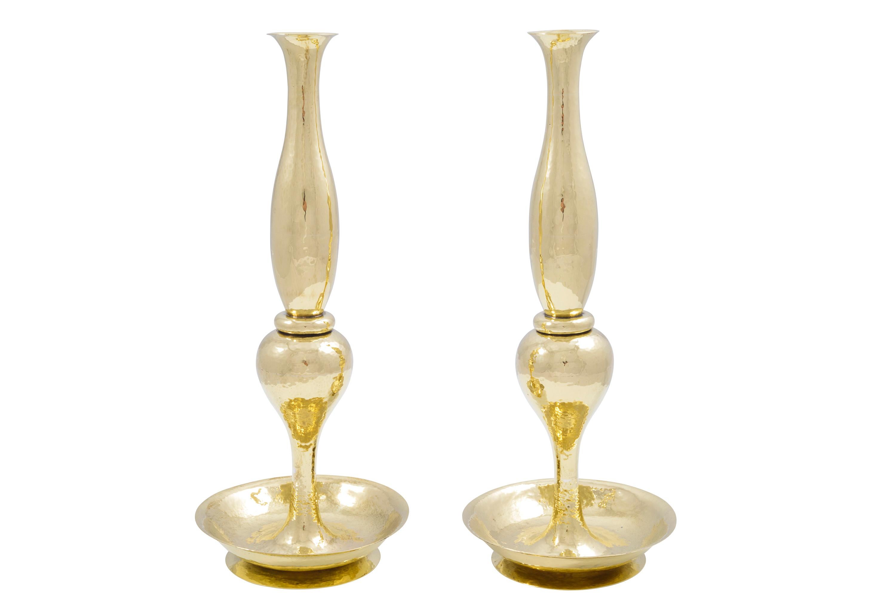 Pair of brass vases Austrian Jugendstil Josef Hoffmann Wiener Werkstatte, circa 1920

Josef Hoffmann designed this pair of vases in the early 1920s, probably around 1921. Hammered entirely out of brass, this pair exudes a particularly fine