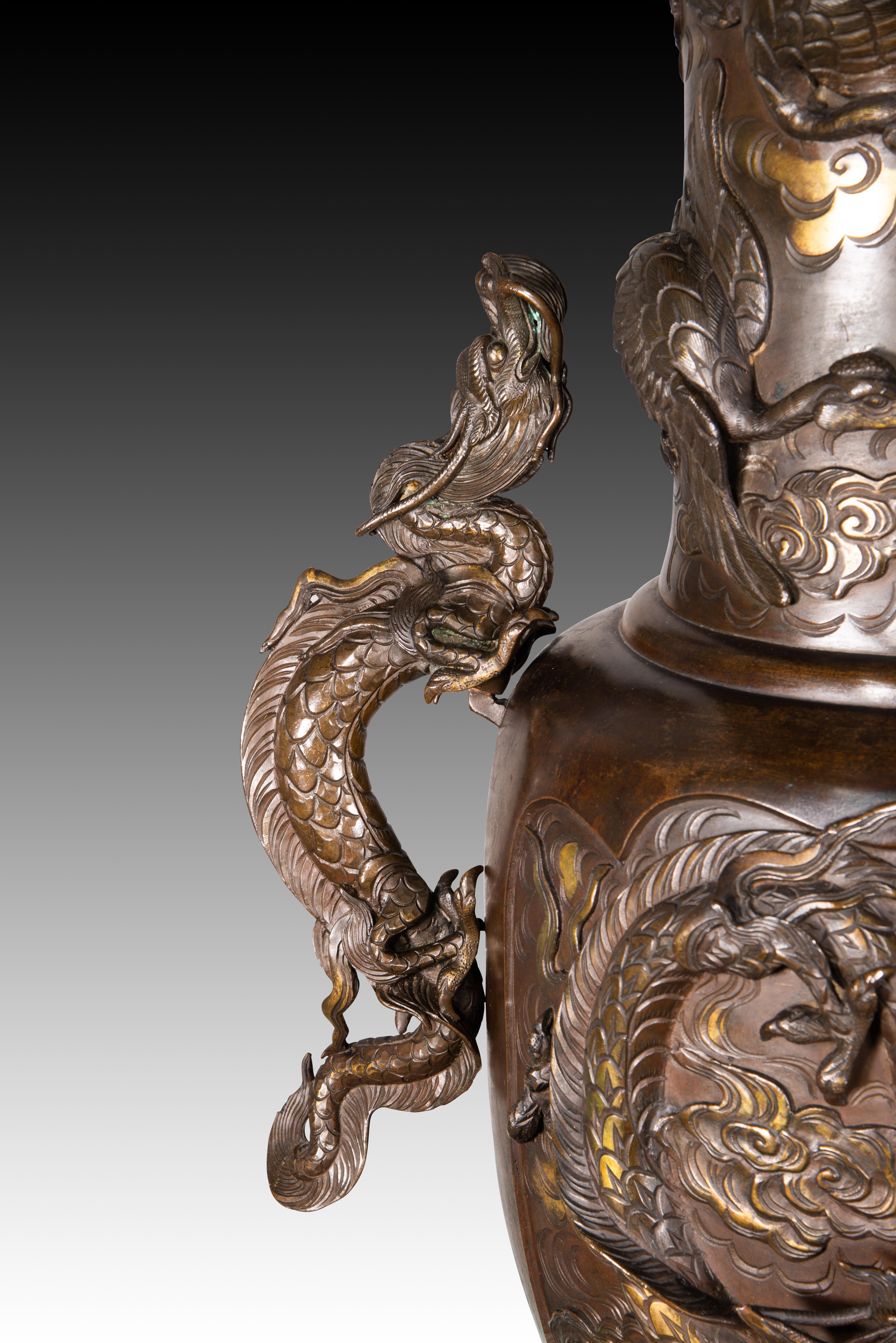 Pair of vases with bases with elephant heads. Bronze, wood, etc. 19th c. etc. 4