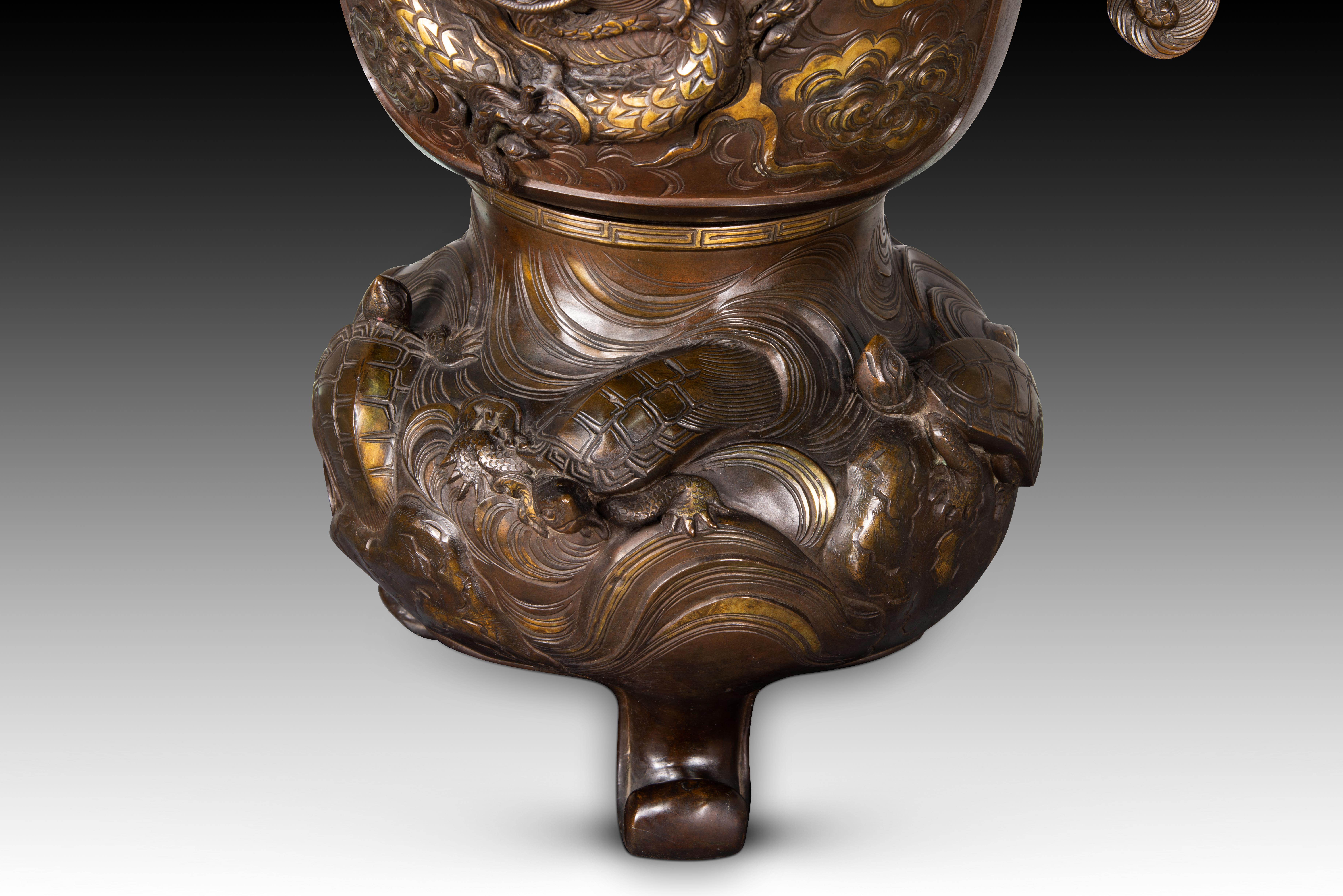 Pair of vases with bases with elephant heads. Bronze, wood, etc. 19th c. etc. 6