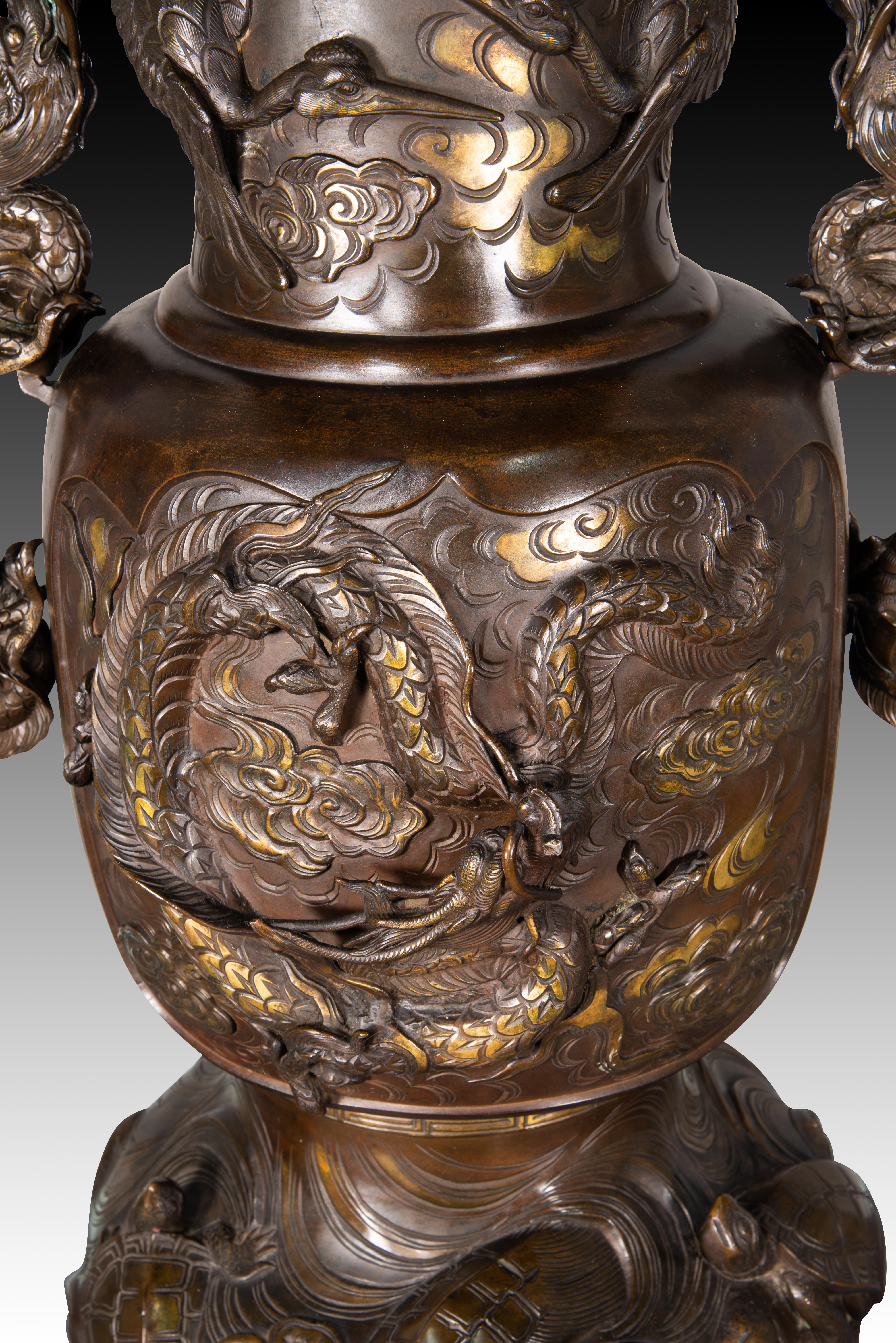 Pair of vases with bases with elephant heads. Bronze, wood, etc. 19th c. etc. 3