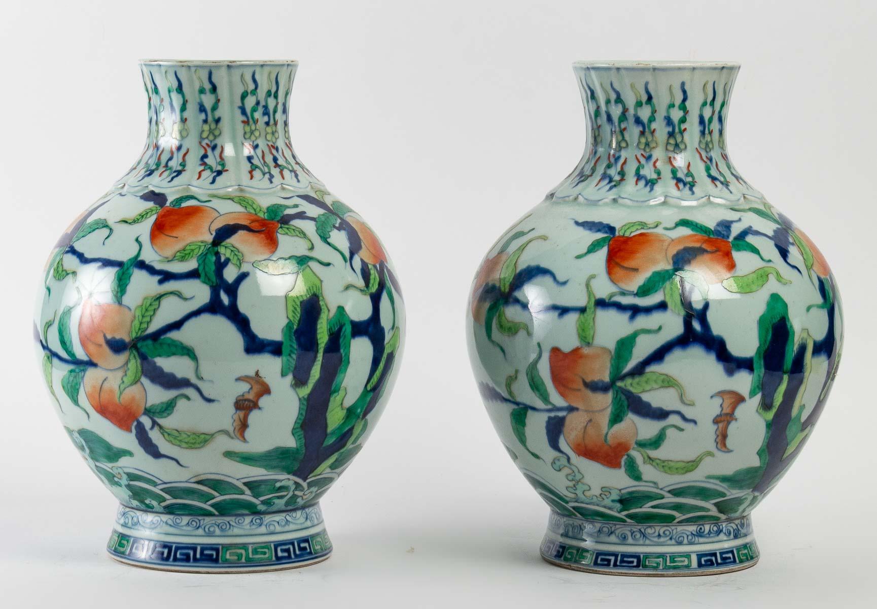 Pair of Porcelain Vases with Peach of Longevity decoration, mark on the bottom of the vases.
China, 20th century.
Perfect condition.
Measure: H: 36 cm, D: 25 cm.