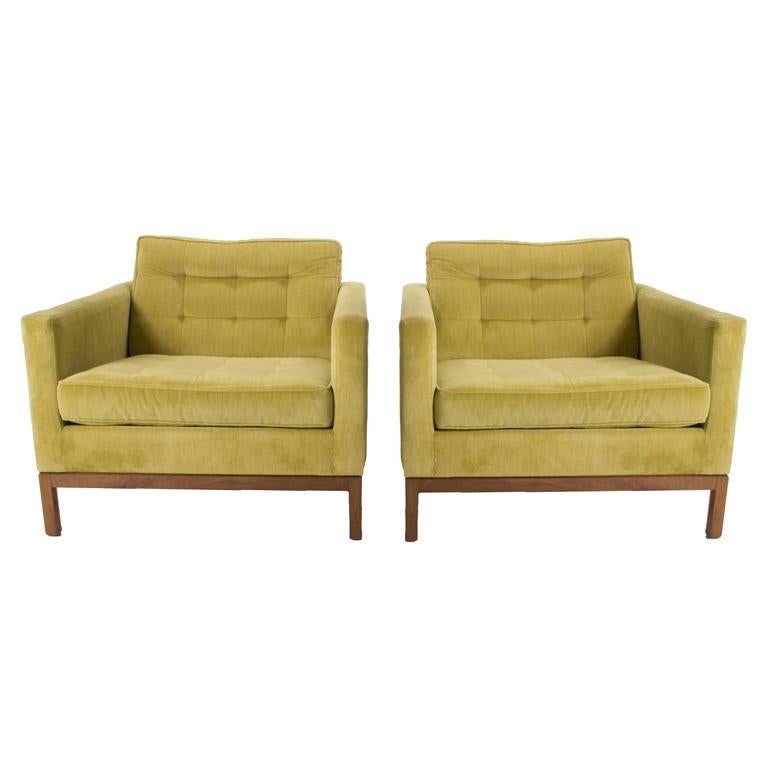 Beautiful Florence Knoll club/lounge chairs on the highly desired wood bases. This is an early version and is no longer made. Lime green colored velvet upholstery, blind-tufted back and seat cushions are all flippable. The solid wood bases have a