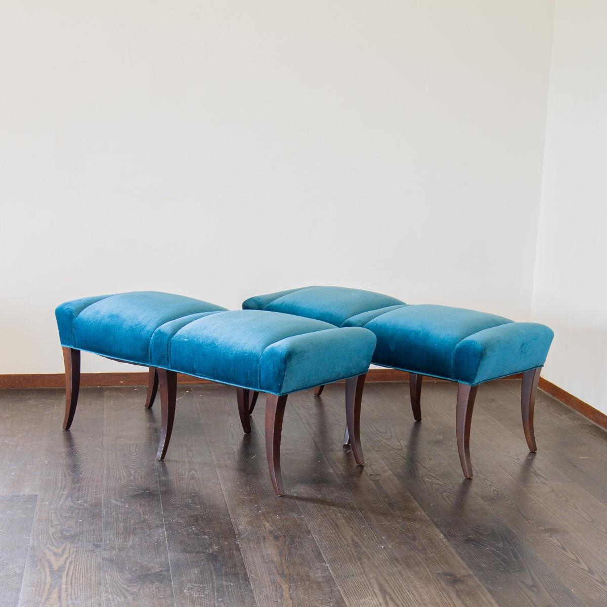 A modern pair of two seater benches/stools in the manner of Parzinger, upholstered in a blue velvet. Each Stool has six deep brown sabre legs. 

The velvet has some imperfections.

 

 