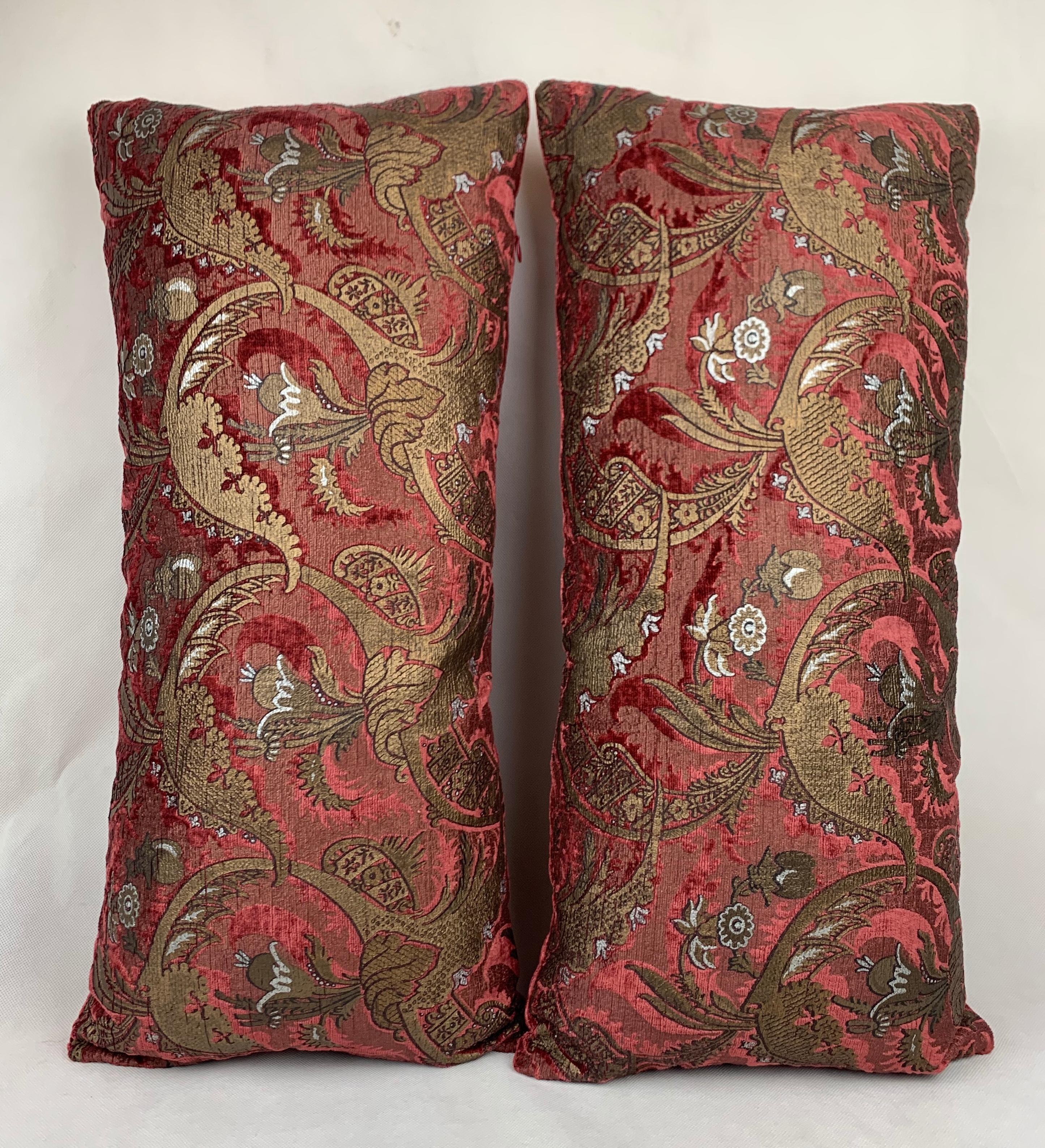 Pair of red and gold oblong printed velvet cushions by Venetia Studium in the 
