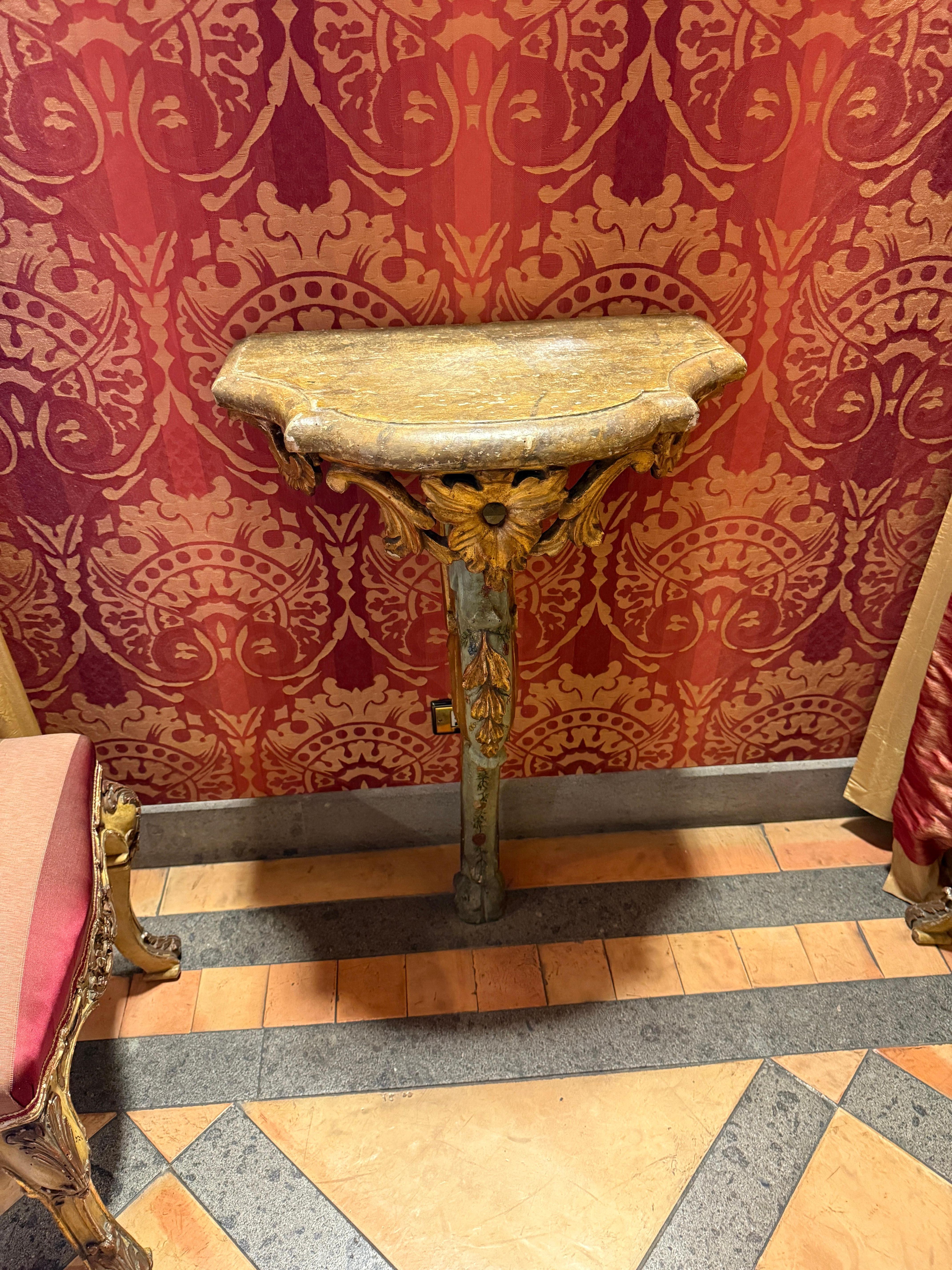Elegant pair of Italian 18th century light blu  painted and parcel-gilt console tables with a painted marble  imitation top Venice 1730'
Proveniente from a Roman  aristocratic estate.
 This items are in original condition with a ware of time and