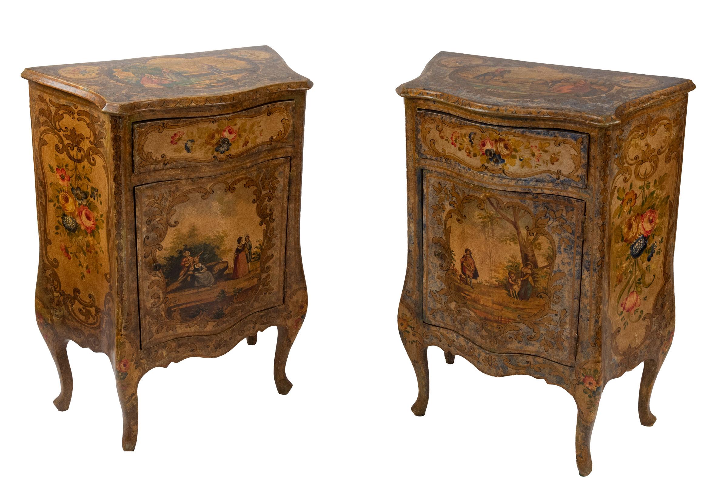 A pair of Venetian commodes or nightstands painted with floral sprays and country scenes.