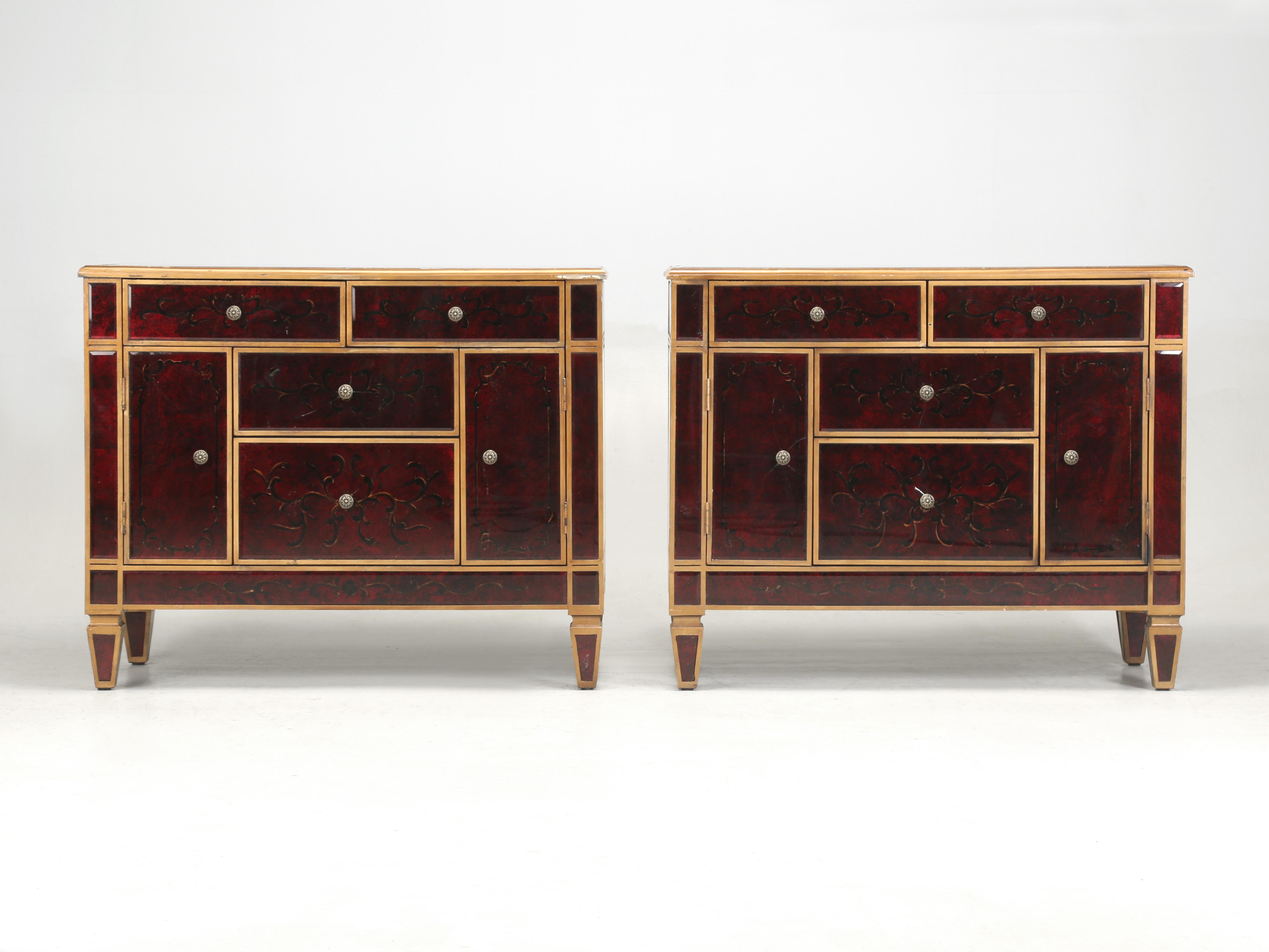 Pair of Incredible Venetian Glass Gilt Commodes or Dressers from Europe. After importing from Europe for over 34-years, you would think you've seen pretty much most designs, that is until now. We found this pair of very unusual Venetian clad chests