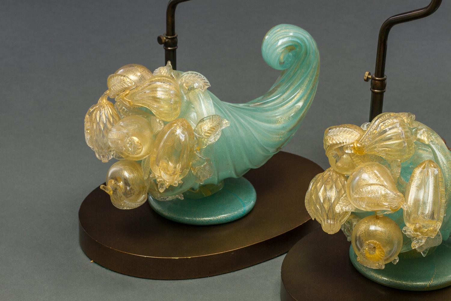 Pair of Venetian glass lamps made from sculptures and finials.