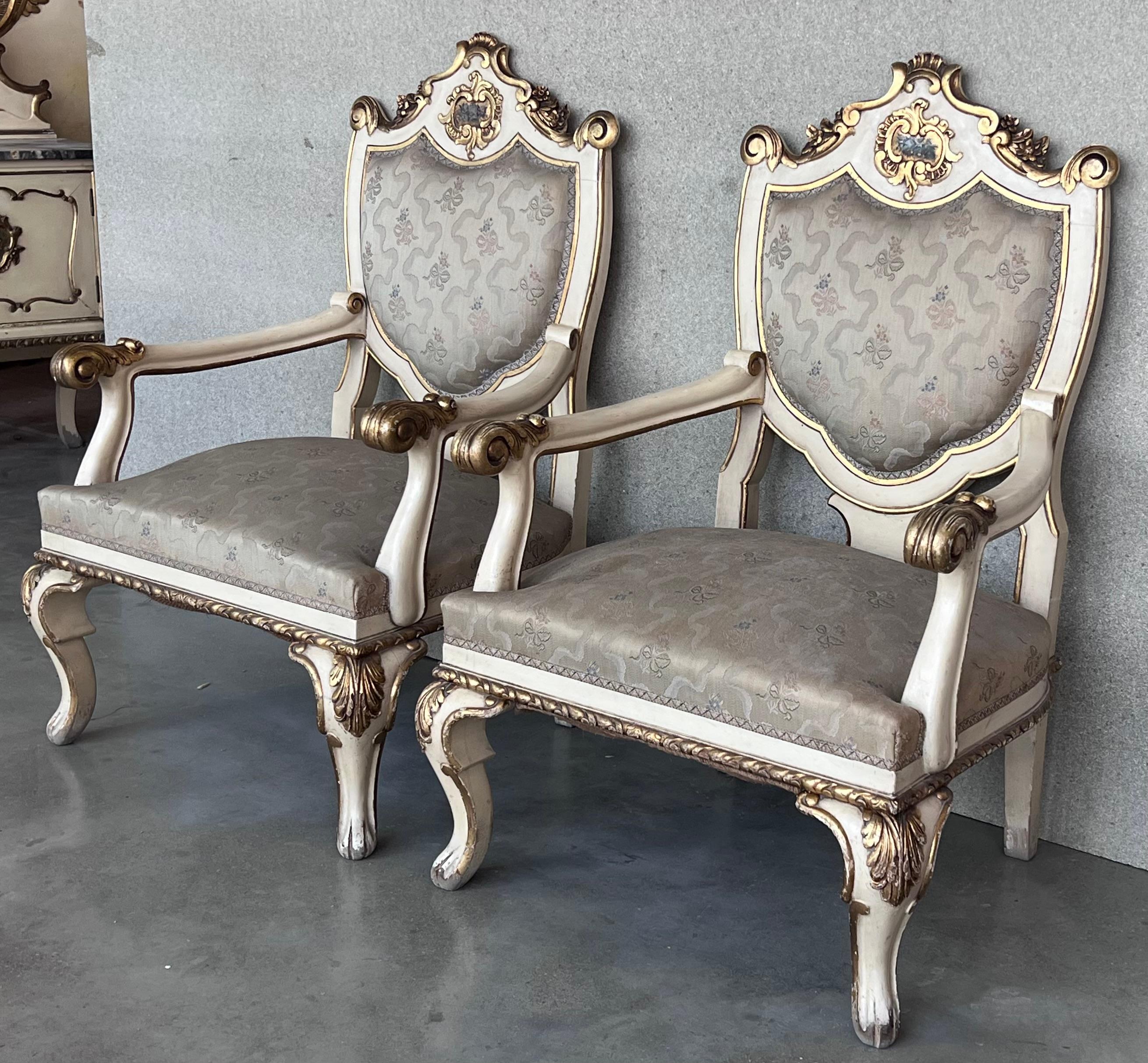 Pair of Venetian hand painted armchairs in white antique painting and giltwood 
Green Velvet in back and seats
Beautiful hand paintings in both backs.