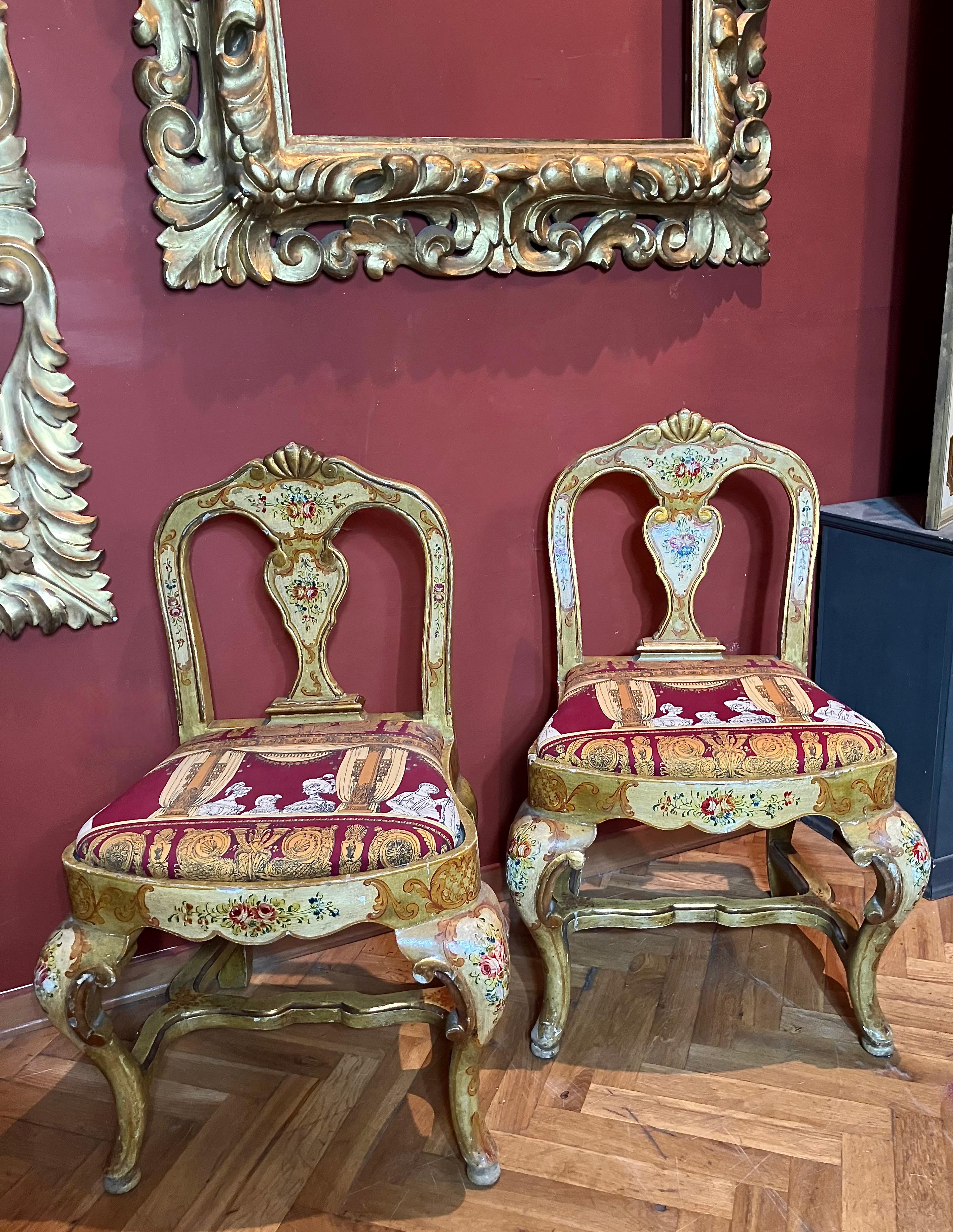 Indulge in the lavish charm Venetian craftsmanship with this exquisite pair of lacquered Rococo-style armchairs.
Likely used as fireside seats, this charming seating set showcases the distinctive characteristics of Venetian lacquer work:
