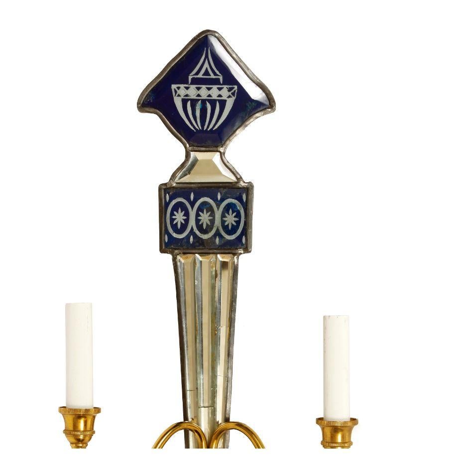 Pair of Venetian cobalt blue glass and clear mirror European sconces in torch form. Each with two-light.