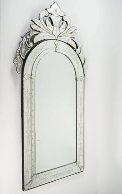 Pair of Venetian Mirror of the 20th century. Glass is etched and bevelled.