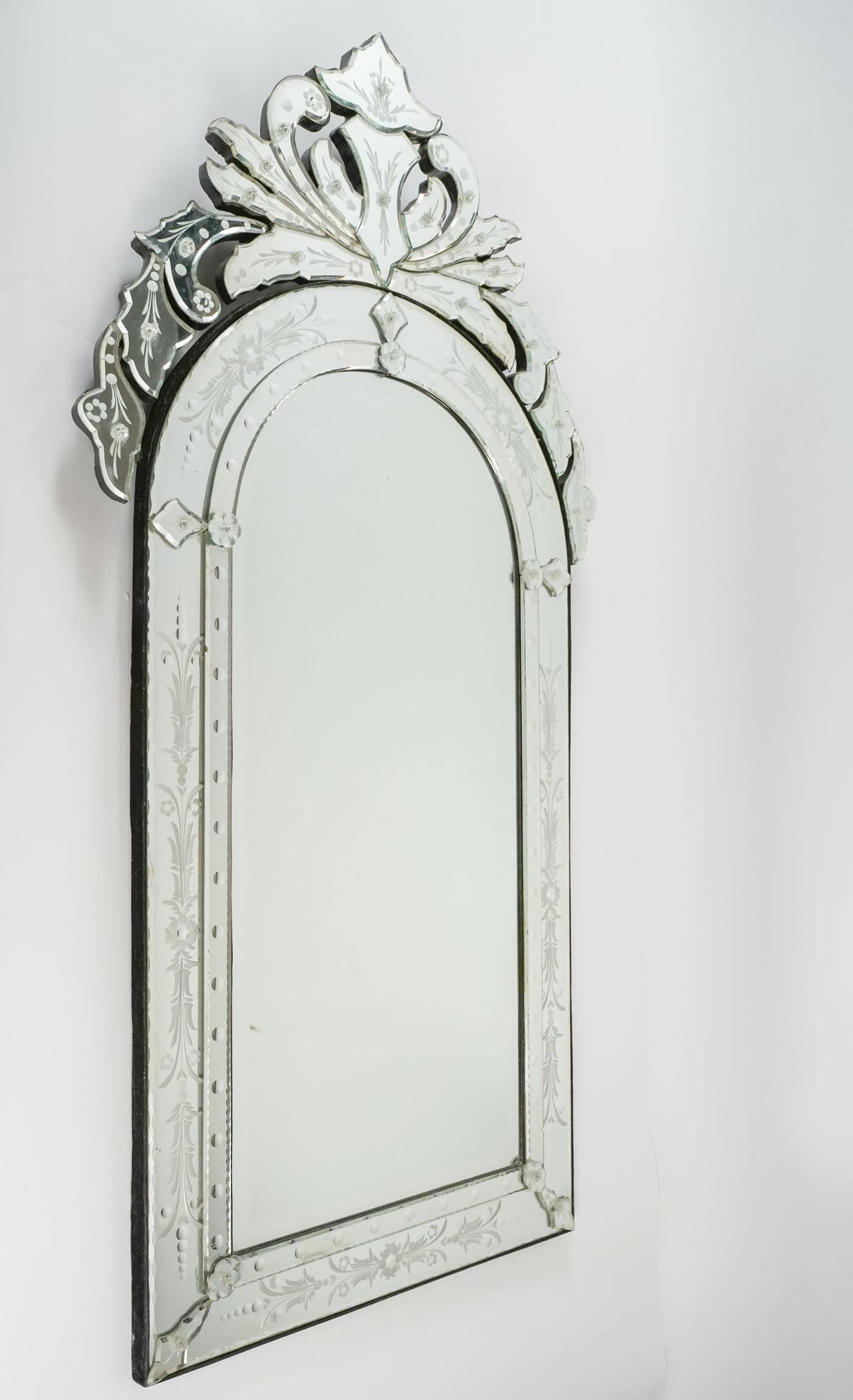 Mid-Century Modern Pair of Venetian Mirror of the 20th century. Glass is etched and bevelled.