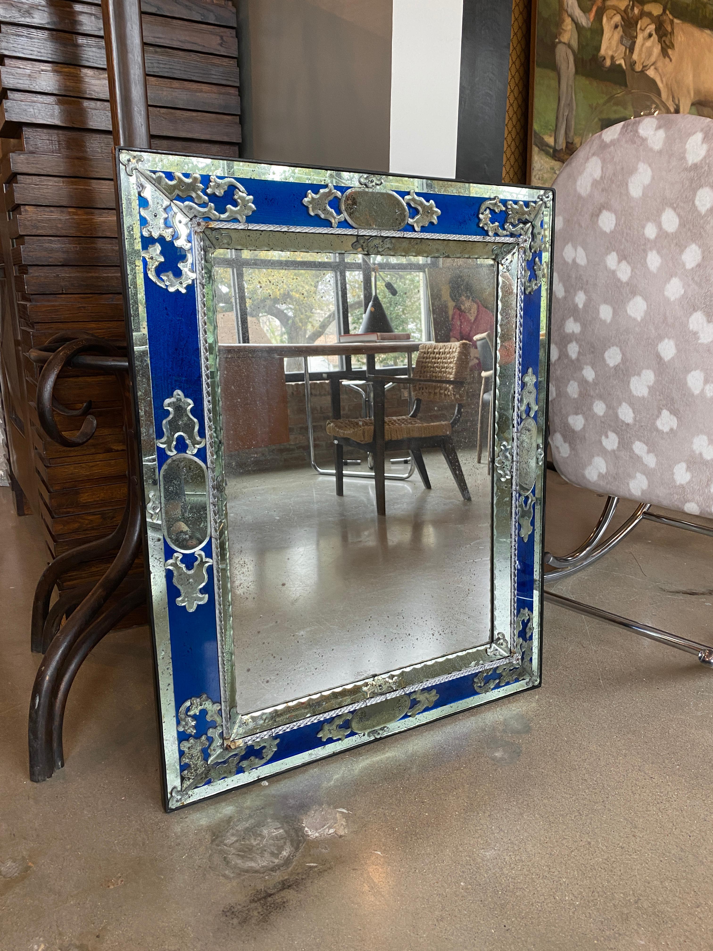 Matched pair of rectangular Venitian mirrors with cobalt blue glass and charming patina to mirror glass. Zoom in on photos. Early to mid-20th century, Italy.