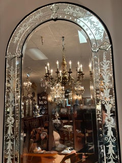 Pair of Venetian mirrors with arched top
