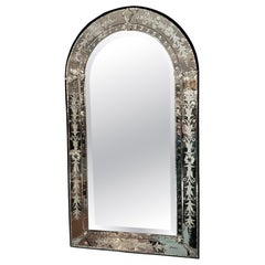 Pair of Venetian mirrors with arched top