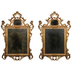 Pair of Venetian Rococo Carved Giltwood Mirrors