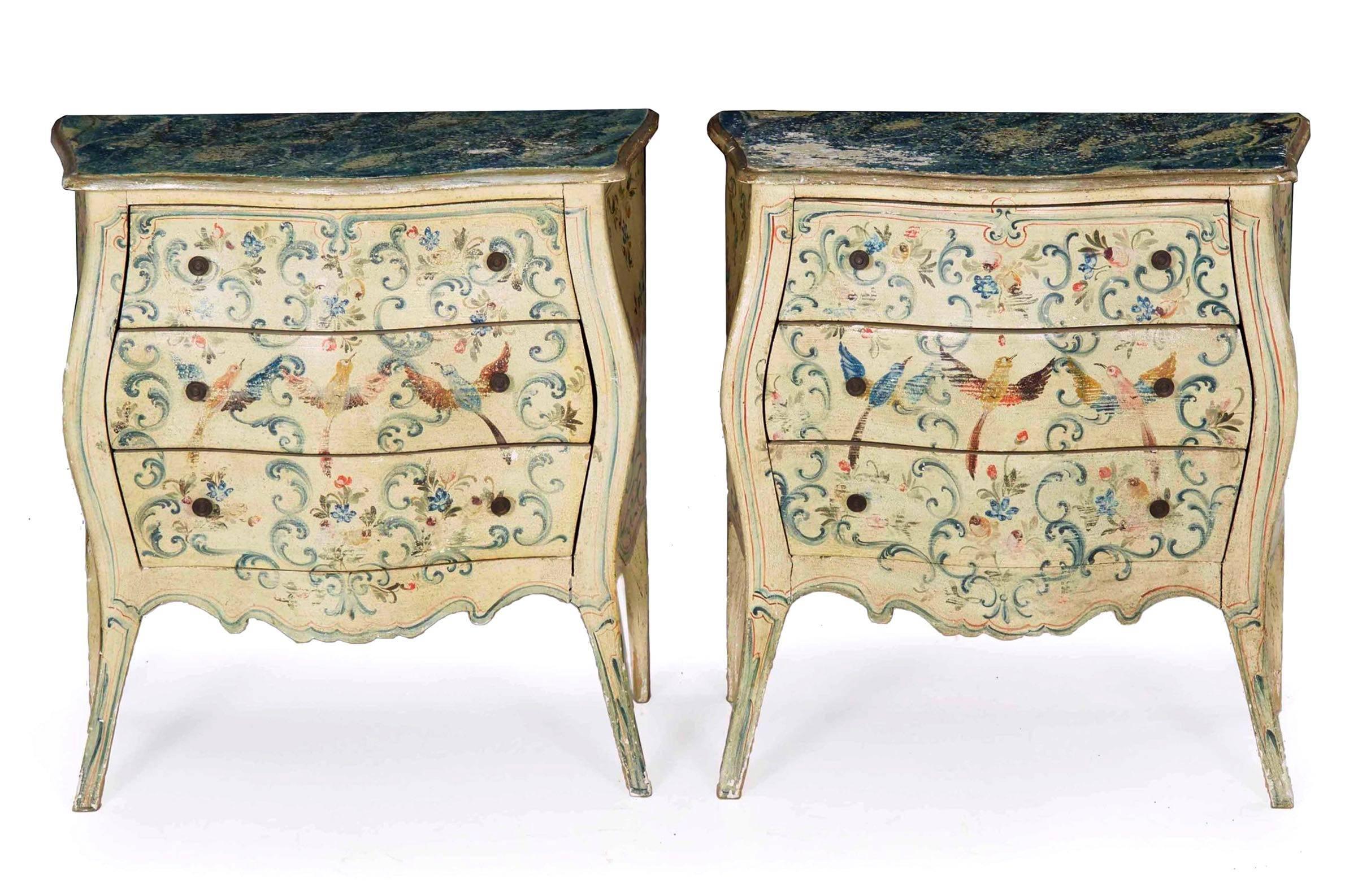 A whimsical and delightful pair of chests with perfectly diminutive proportions, these are such a wonderful pair to flank a bed with restrained sizes and practical storage. The old paint is worn and crackled from years of gentle use, the hummingbird