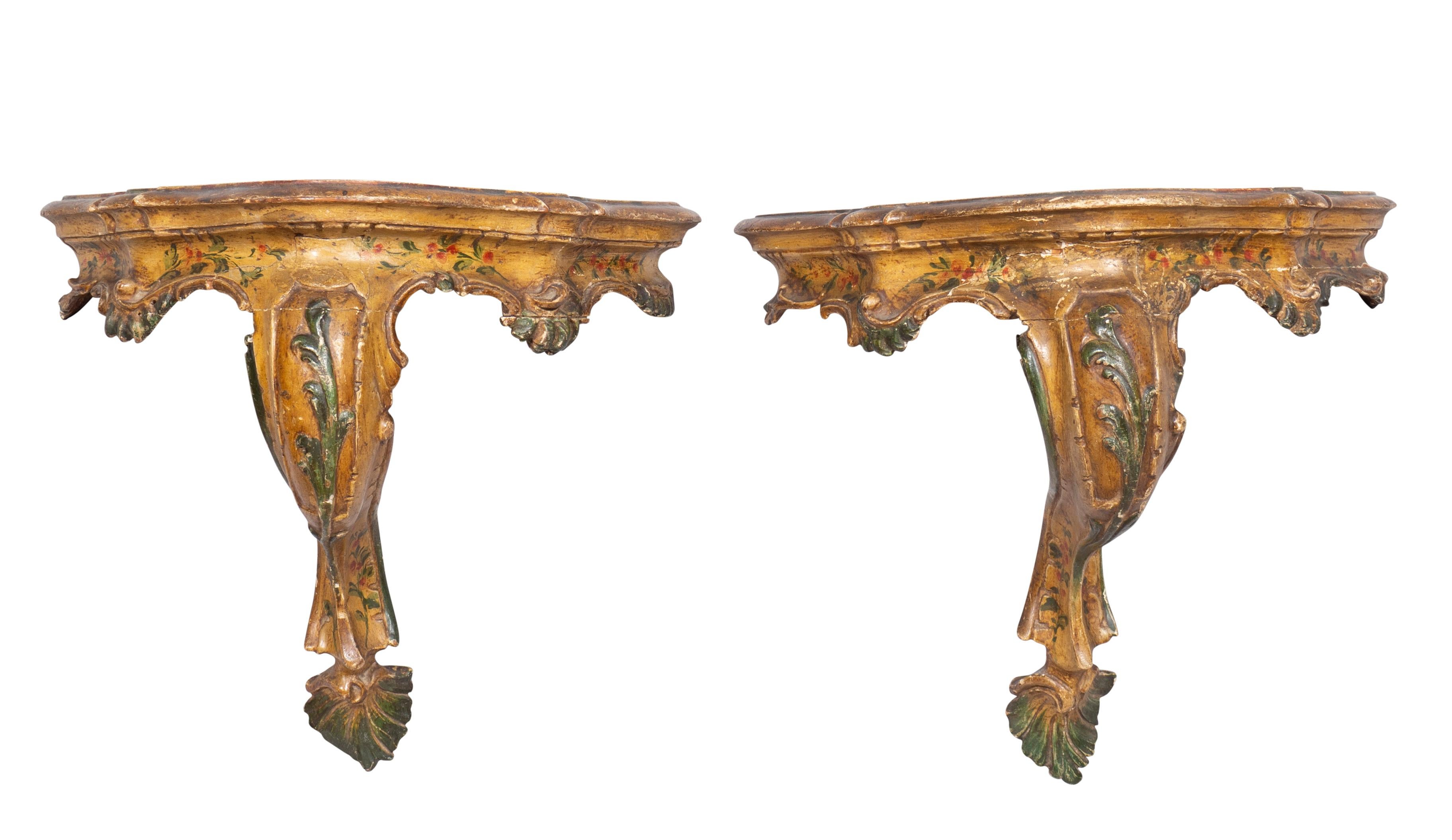 Each with serpentine faux painted tops and conforming frieze. Floral yellow, green and gold decoration. Serpentine monopodia.