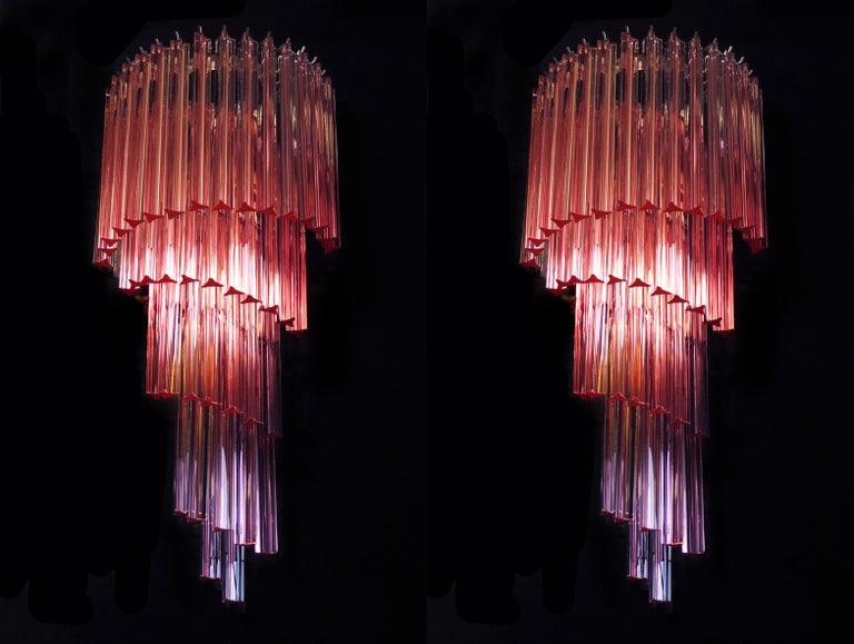 Huge and fantastic pair of vintage Murano wall sconces made by 41 Murano crystal prism (triedri) for each applique in a chrome metal frame. The shape of this sconce is spiral. The glasses are pink.
Period: late 20th century
Dimensions: 31.50