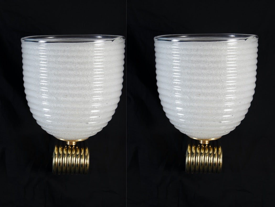 A fine pair of Venini Art Deco brass mounted Murano glass sconces or wall lights wit a precious hand blown Murano glass cup. 
Each with 1 E27 light bulb.