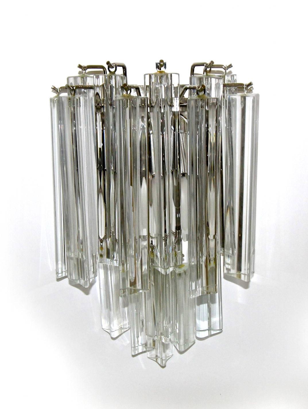 Pair of Venini for Camer glass clear crystal glass Triedri prism wall sconces with chrome-plated back plates. Each sconce uses two candelabra base bulbs. Newly wired. (2nd set available under separate listing.).