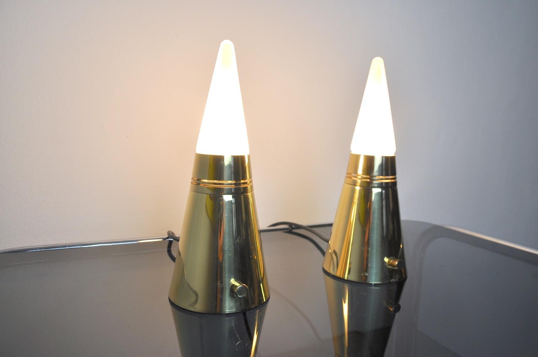 Very nice pair of cylindrical Venini lamps dating from the 70s designed and produced in Italy. Brass base with intensity regulator that allows you to create a subdued atmosphere. This unique design pair will perfectly illuminate your interior.