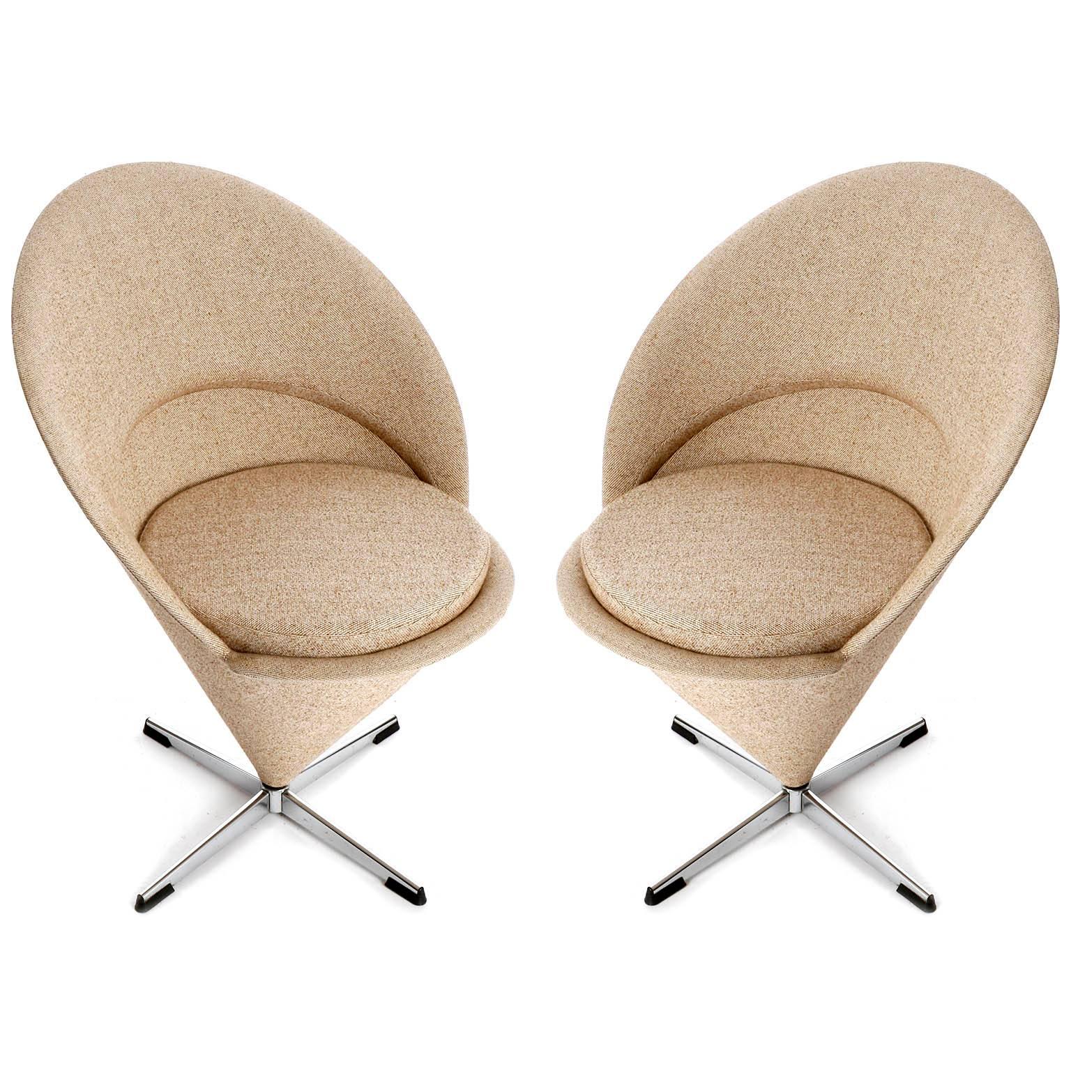 A pair of Danish modern Cone chairs designed by Verner Panton (1926-1998) in 1958 and manufactured in mid-century, circa 1960. The chairs are in very good original condition with an original brown and beige wool upholstery.

About Verner