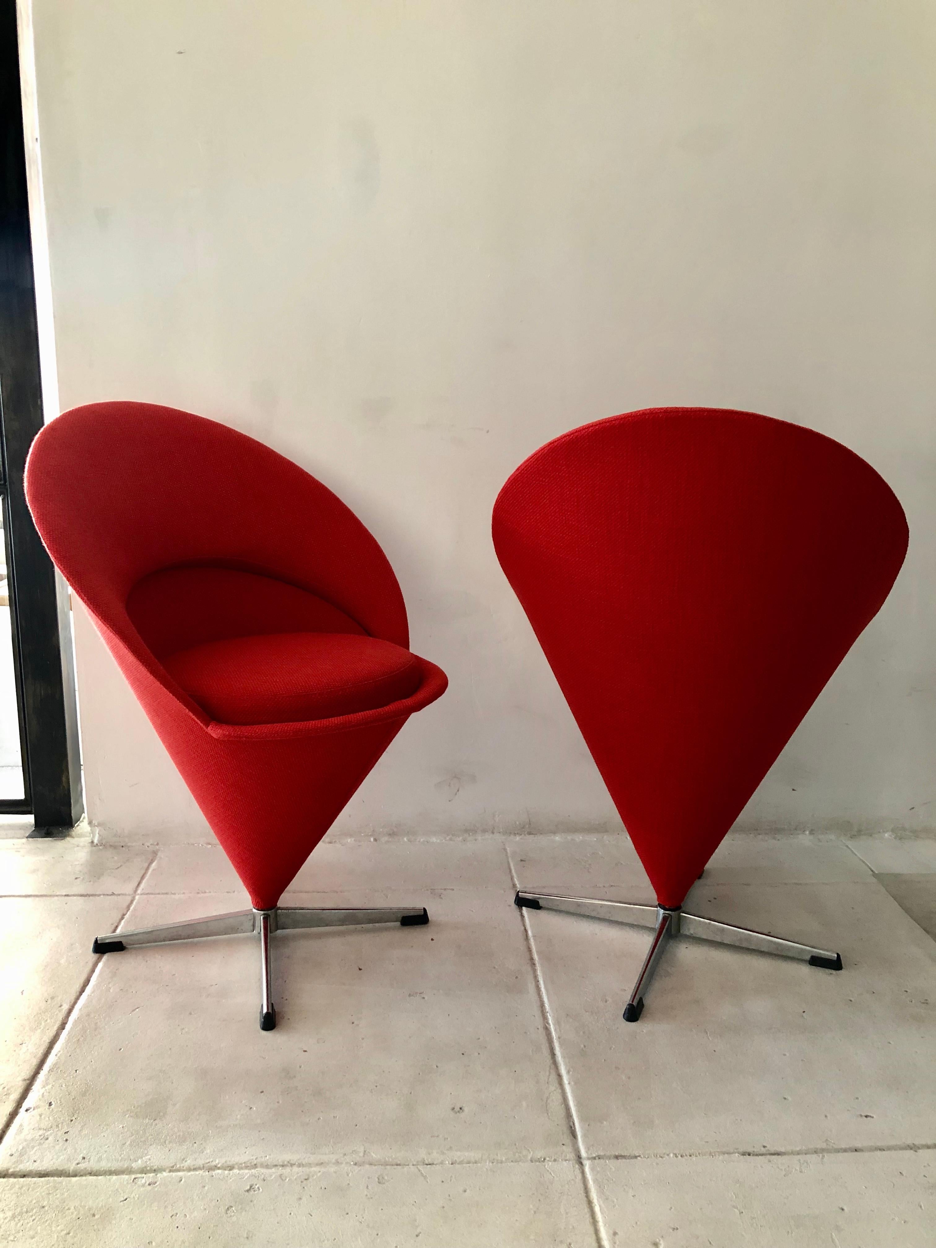Pair of Verner Panton cone chairs. Made by Frem Rojle, Denmark, 1958. Upholstery over steel, chrome-plated steel.