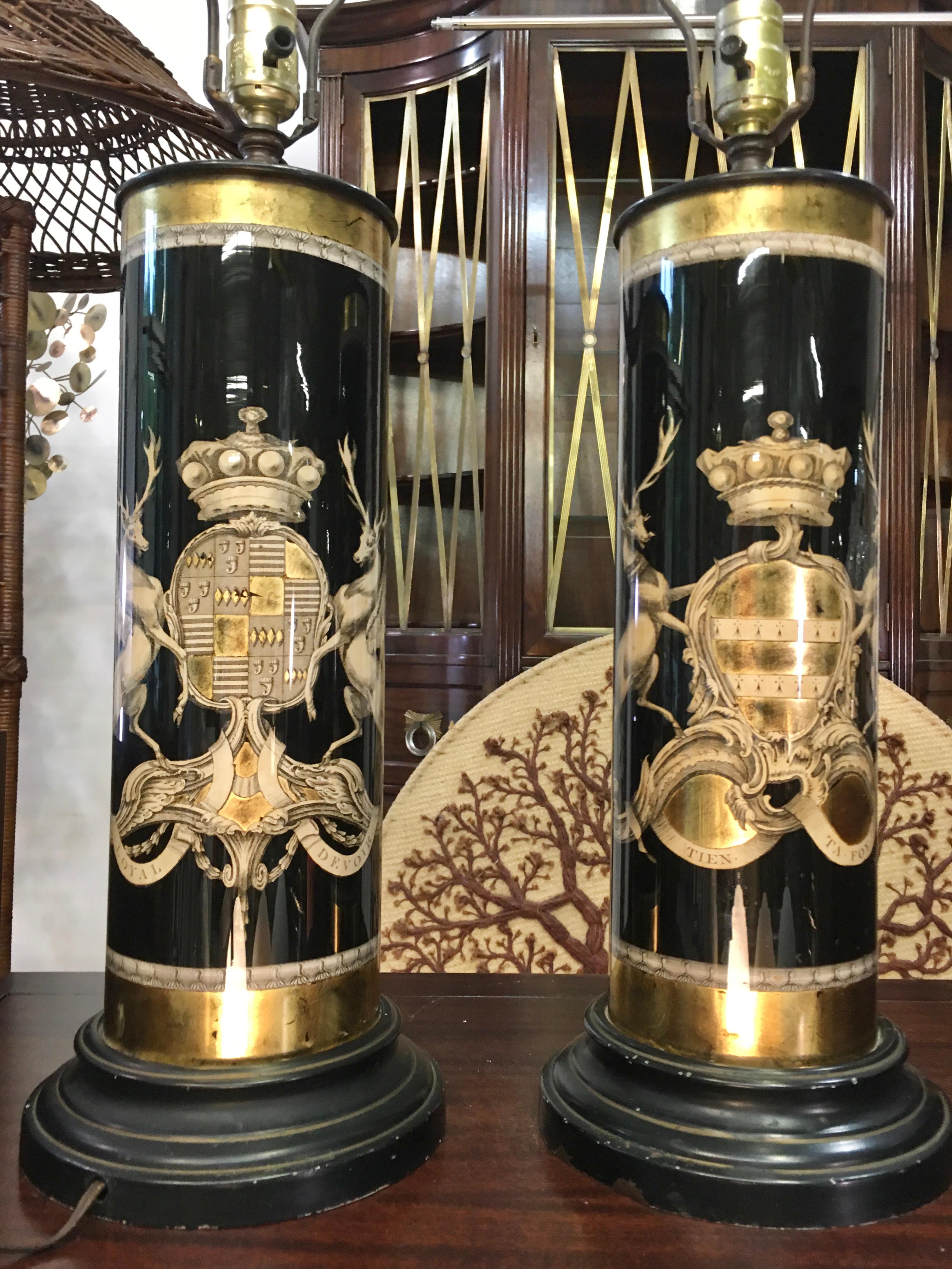 Pair of vintage reverse painted glass cylinder lamps, black and gilding, depicting the coats of arms of British aristocratic families of Bathurst and Granville.
The overall height from the base to the top of the finial is approximately 32.5 in. The