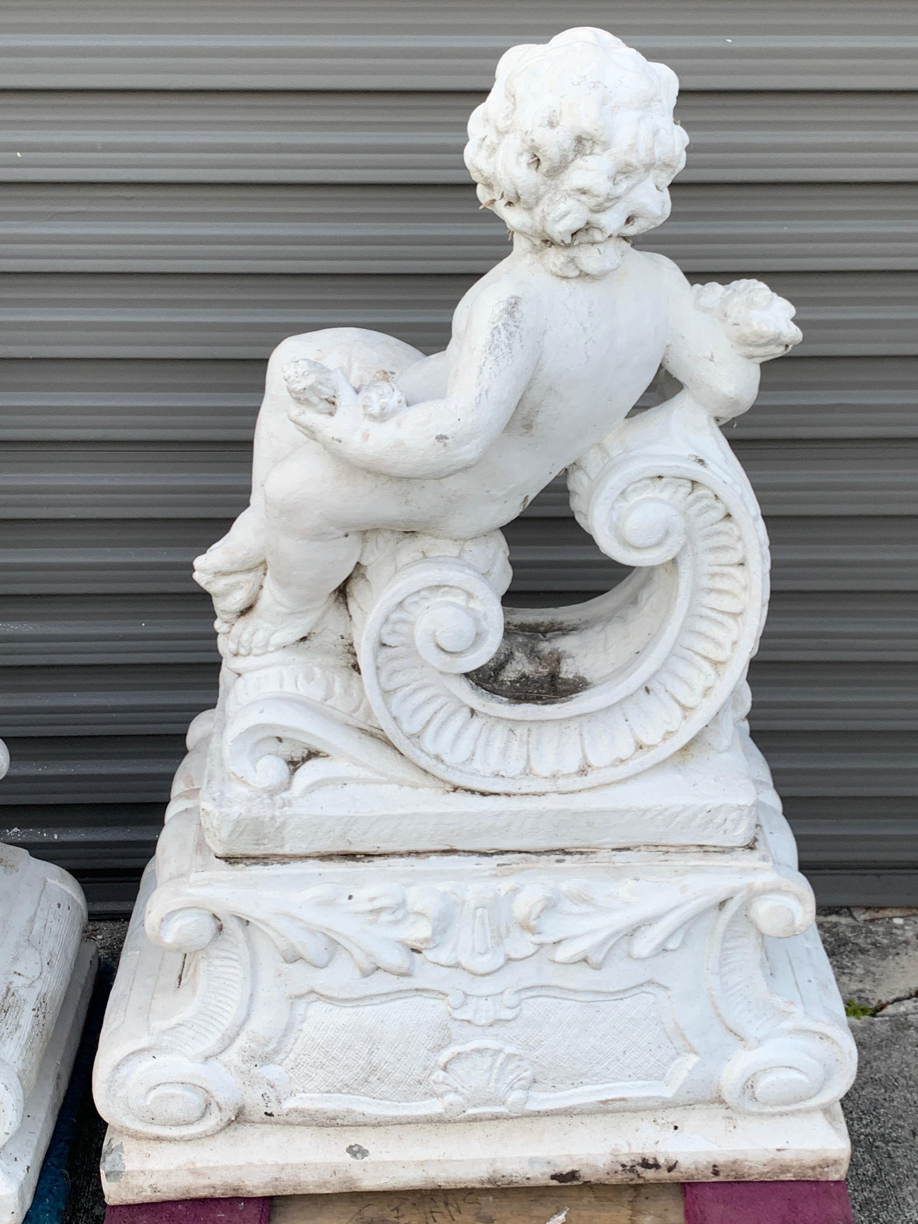 Pair of Vintage Cast Stone Statues of Recumbent Putti on Pedestal Bases 2