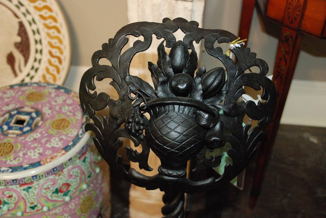 Pair of continental andirons, with large pierced and wrought Iron Florets.